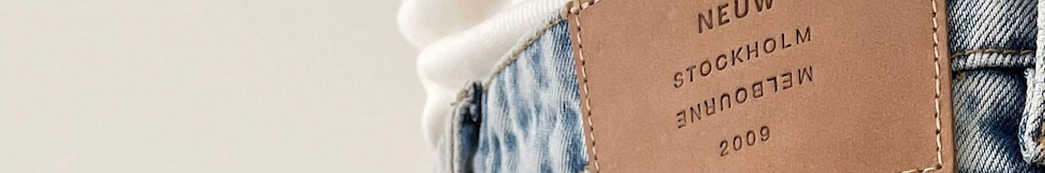 Neuw denim jeans leather patch detail on waistband, modern fit and workmanship from independent denim brand founded 2009