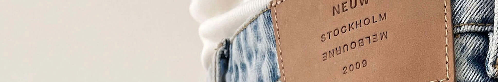 Neuw denim jeans leather patch detail on waistband, modern fit and workmanship from independent denim brand founded 2009