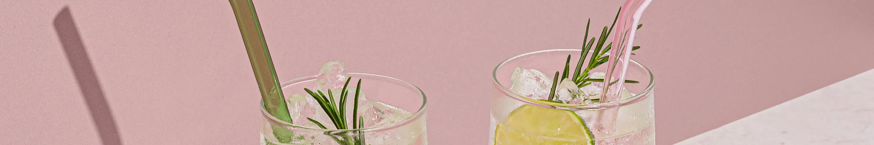 Alt Tag: Sucker sustainable glass straws in cocktails, elegant eco-friendly drinking accessories for stylish everyday moments