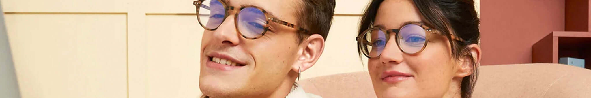 Alt Tag: Izipizi reading glasses on stylish couple, modern French eyewear with sleek colourful frames for everyday comfort