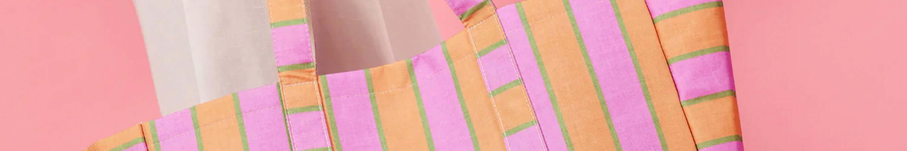 Kollab signature pastel stripe print on practical shopper tote and lunch bag fabric, showcasing stylish functionality