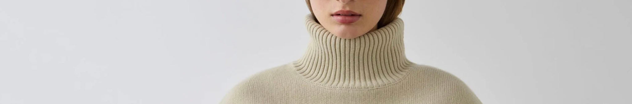 Alt Tag: Laing premium womenswear cashmere knit turtleneck sweater in cream, elevated everyday wardrobe essential