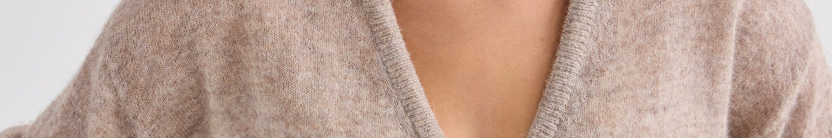 Laing timeless cashmere crew sweater in soft pink with elegant neckline detail, designed to stay current for years