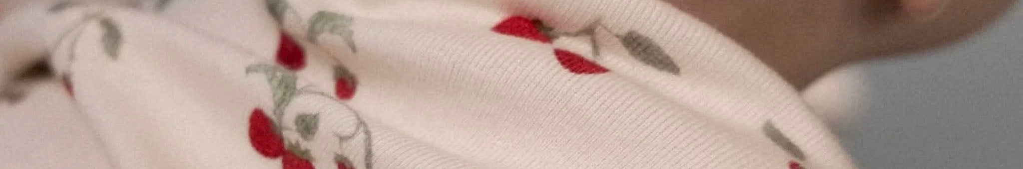 Alt Tag: Nature Baby organic cotton baby blanket with floral print, soft sustainable newborn essentials from New Zealand