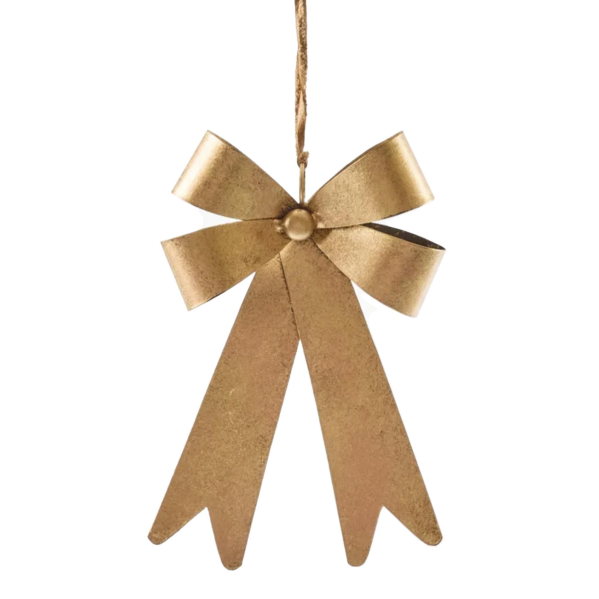 Gold bow-shaped ornament hanging on a white background