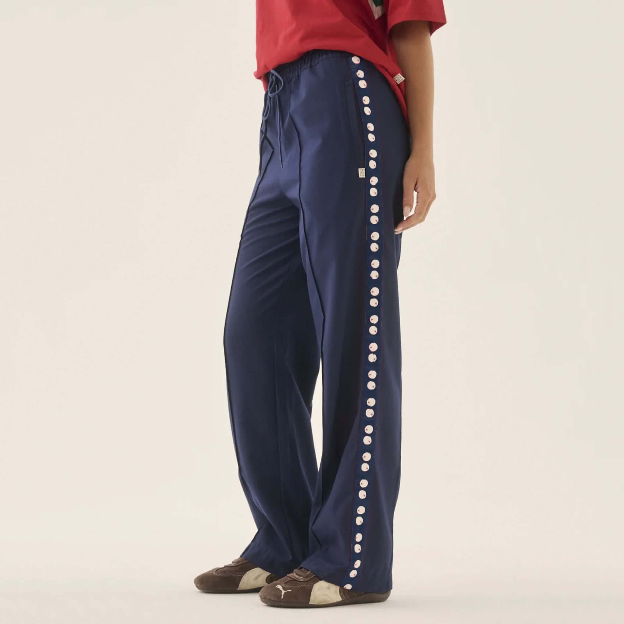Araminta James Pomodoro Twill Pants - Midnight Navy showcasing a straight-leg cut with satin side trims.