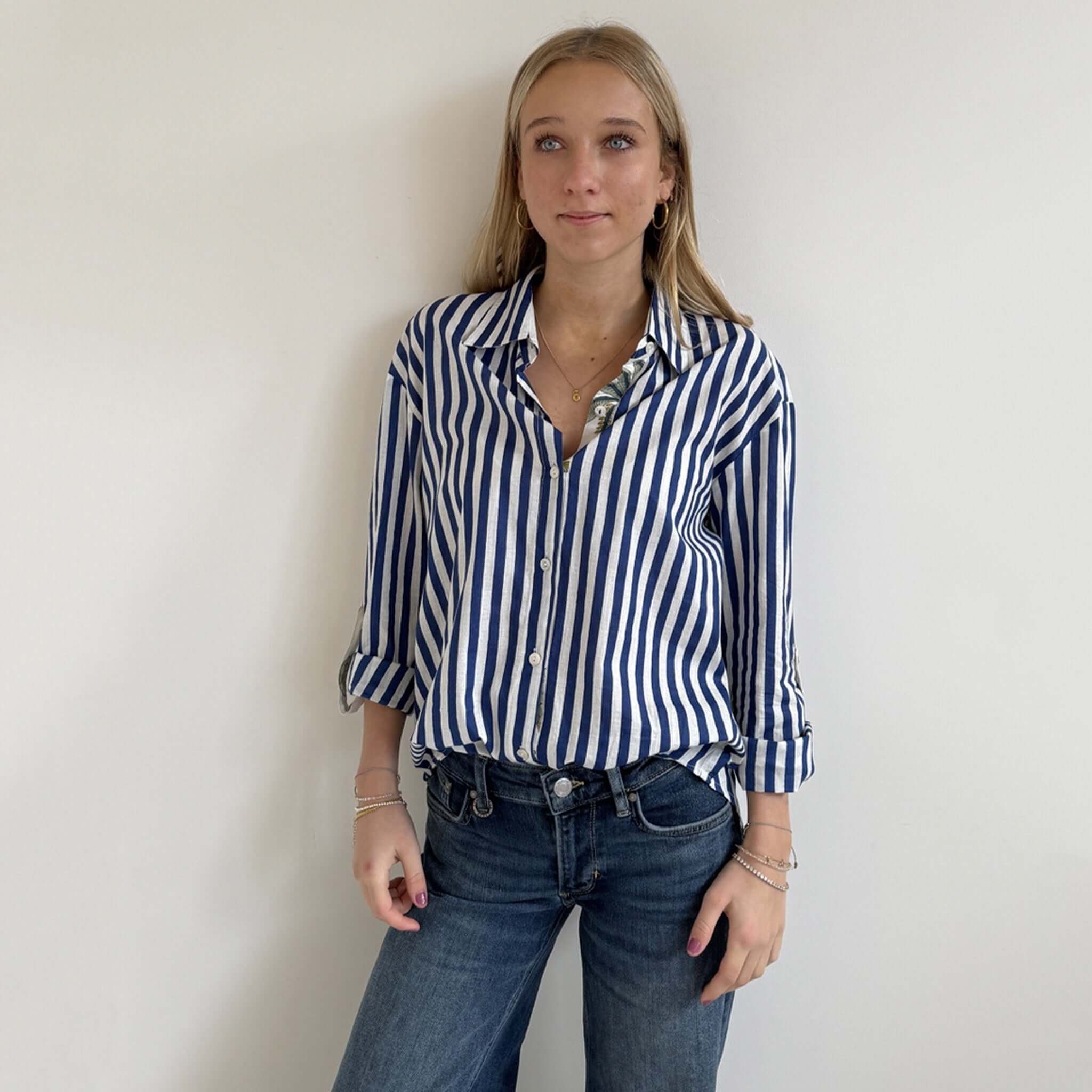 Art In My Wardrobe Annie Shirt - Blue featuring bold blue and white stripes with floral details, perfect for a stylish look.