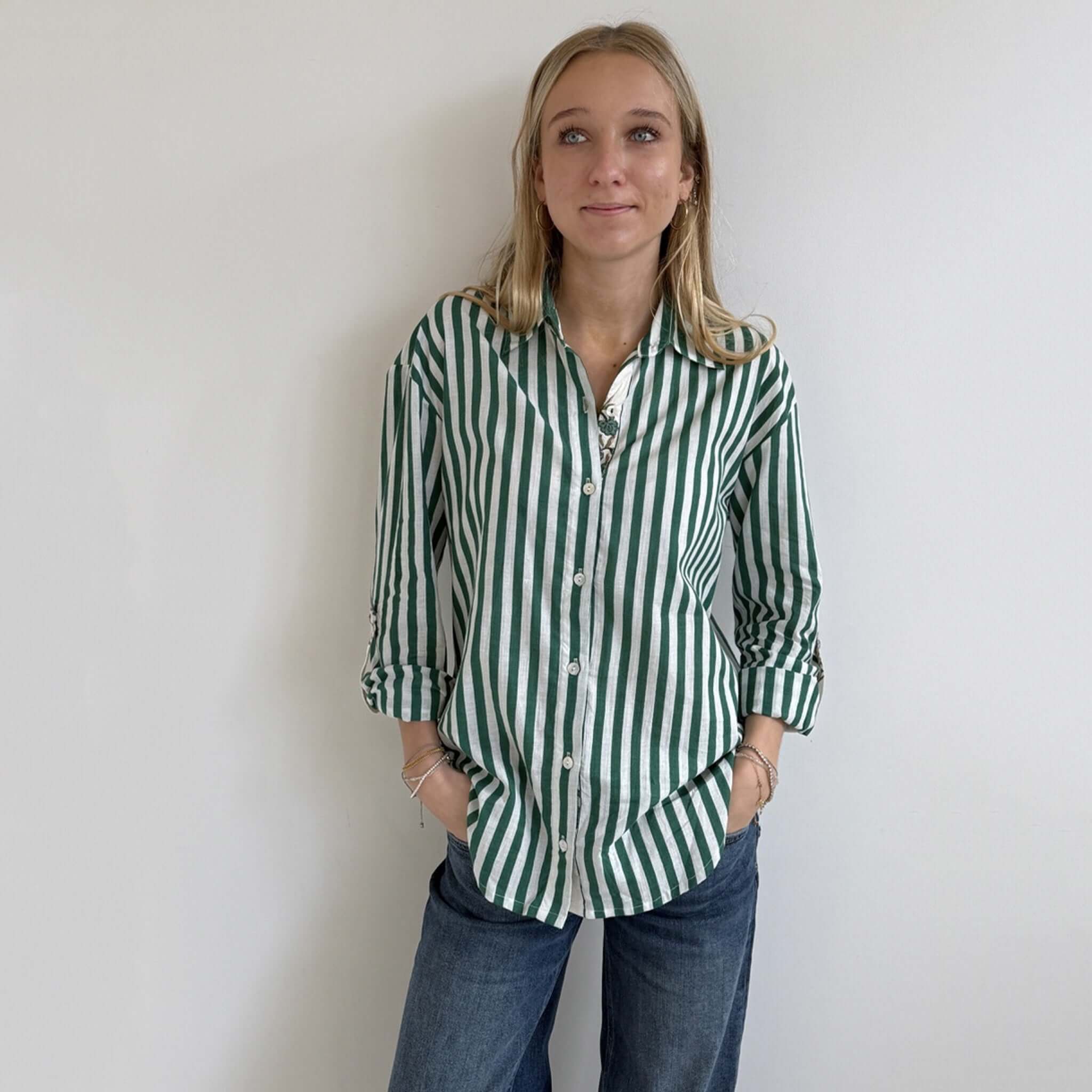 Art In My Wardrobe Annie Shirt - Green being worn, featuring bold green and white stripes, floral details, and casual styling.