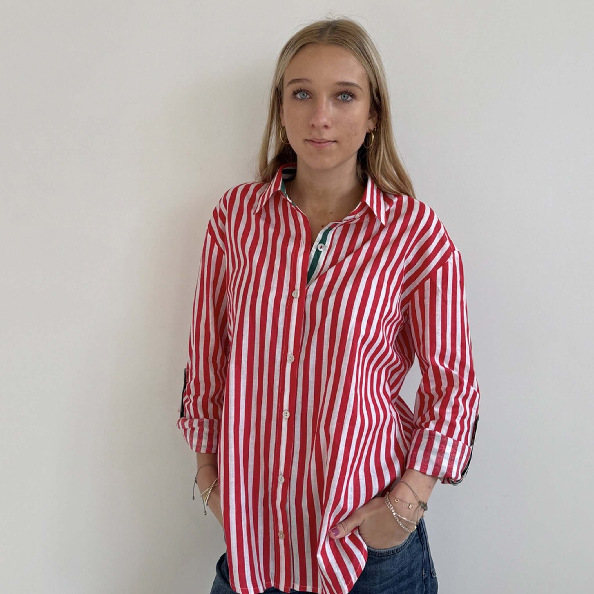 Art In My Wardrobe Annie Shirt - Red worn by model, featuring bold red and white stripes with green details.