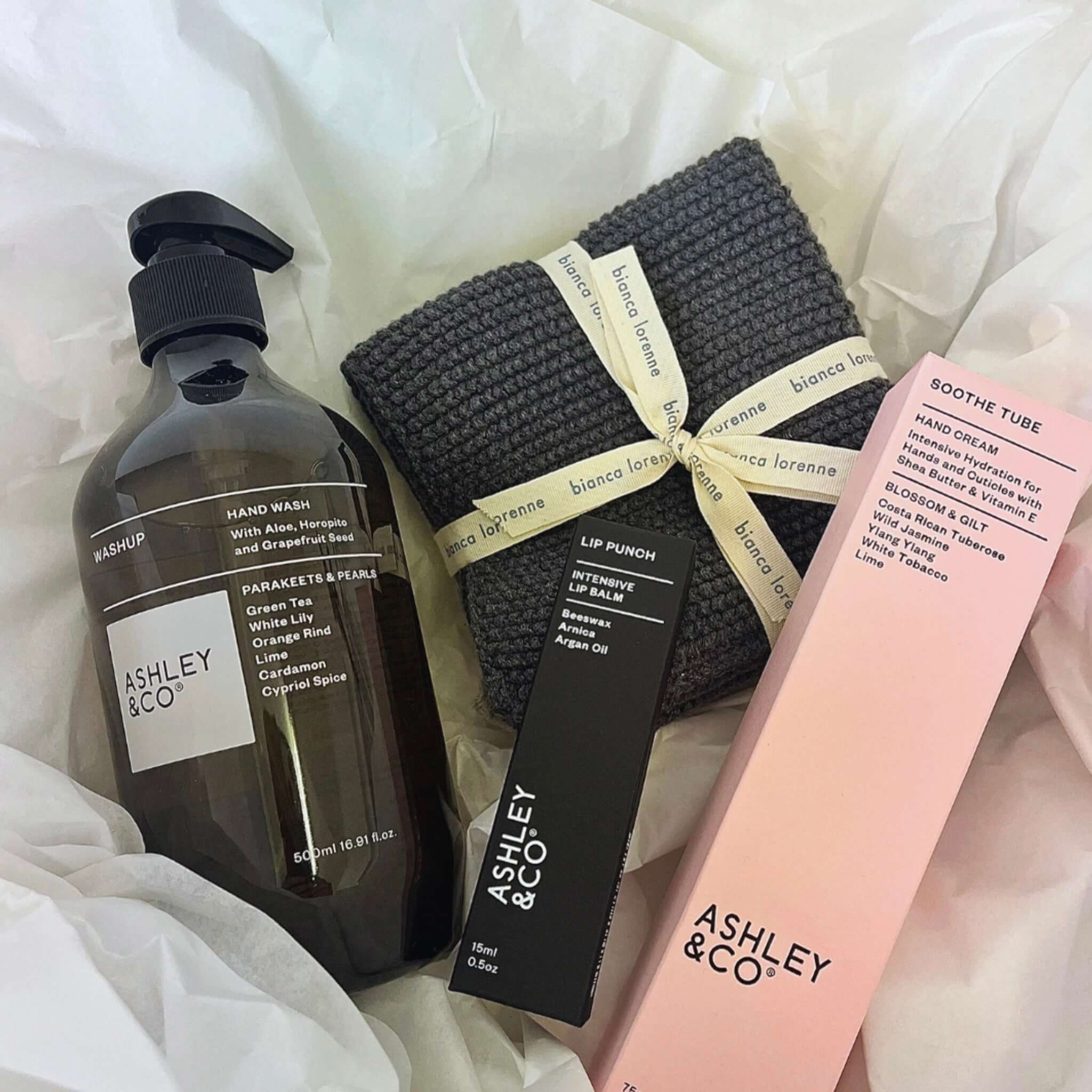 Alt Tag: Ashley & Co Gift Box - Gone Green Mortar & Pestle with hand wash, soothe tube and Bianca Lorenne grey wash cloths in white box