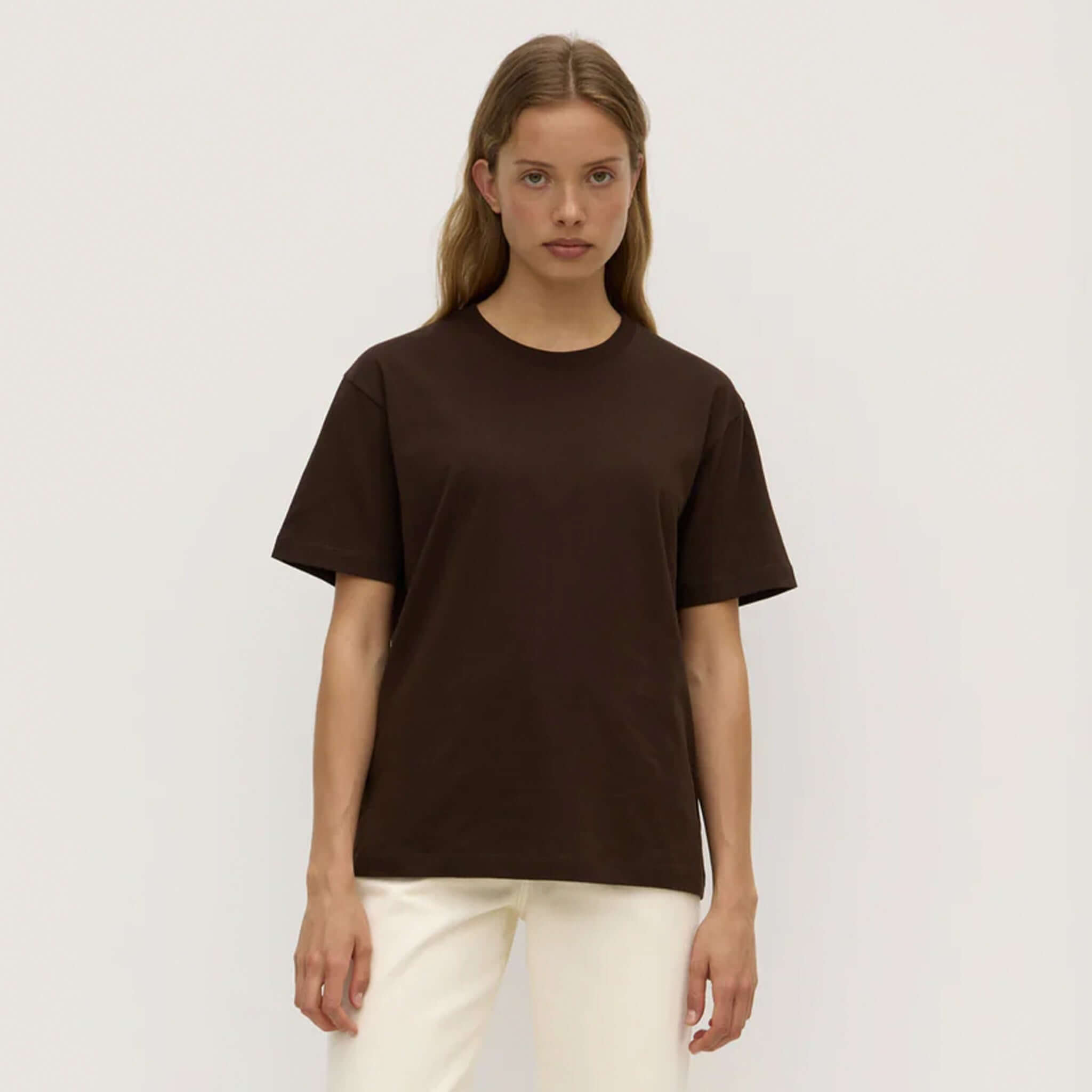 Alt Tag: Assembly Label Organic Cotton Base Tee - Ganache on model, relaxed crew neck organic cotton jersey t-shirt in deep brown