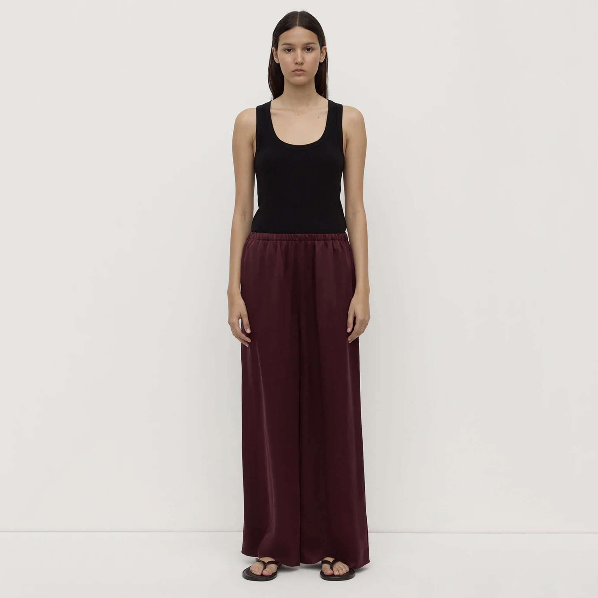 Alt Tag: Assembly Label Pippa Silk Pants - Merlot on model, wide-leg 100% silk pants with elastic waistband in rich merlot