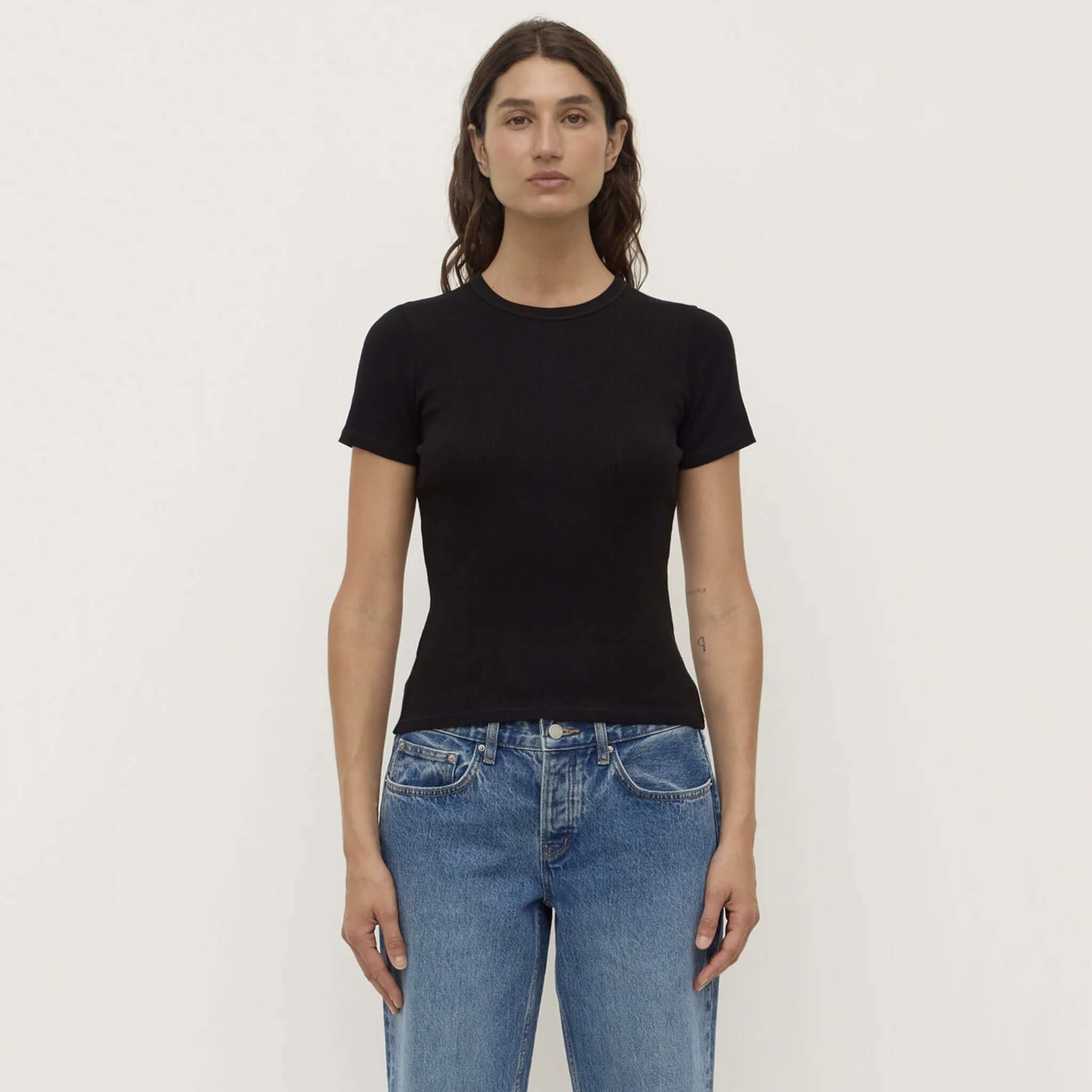 Alt Tag: Assembly Label Zali Short Sleeve Tee - Black ribbed fitted 100% cotton crew neck tee on model, short sleeves