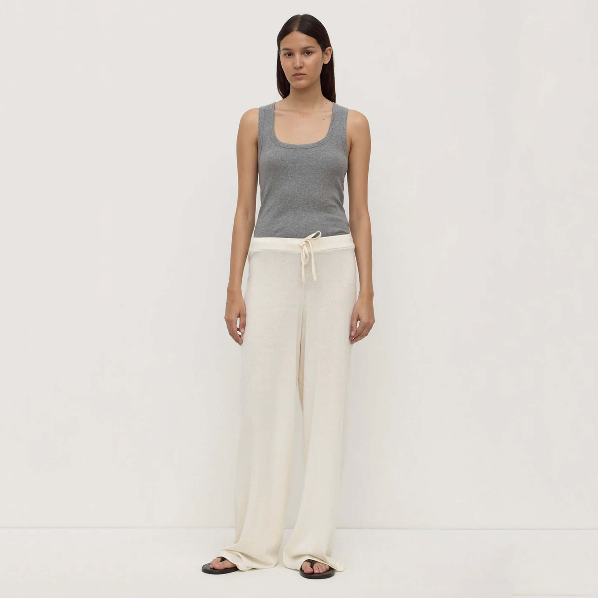 Alt Tag: Assembly Label Cotton / Cashmere Lounge Pants - Cream on model, relaxed leg fit with covered elastic waistband and waist tie