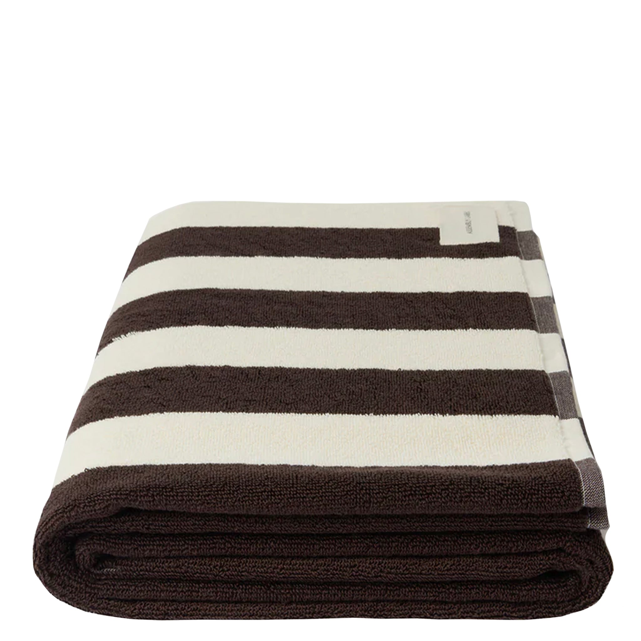 Folded brown and white striped towel on a white background