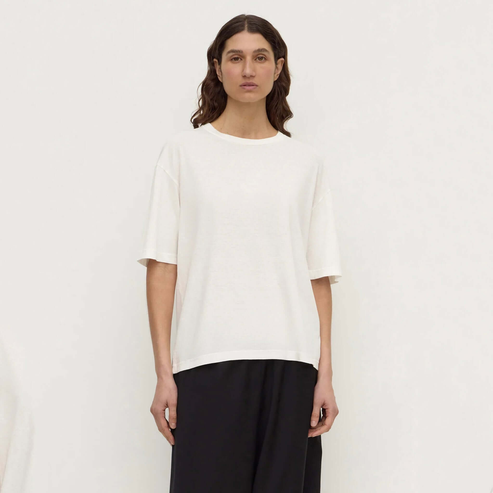 Assembly Label Kira Cotton Hemp Tee - Antique White worn by model, showcasing its relaxed fit and natural texture.