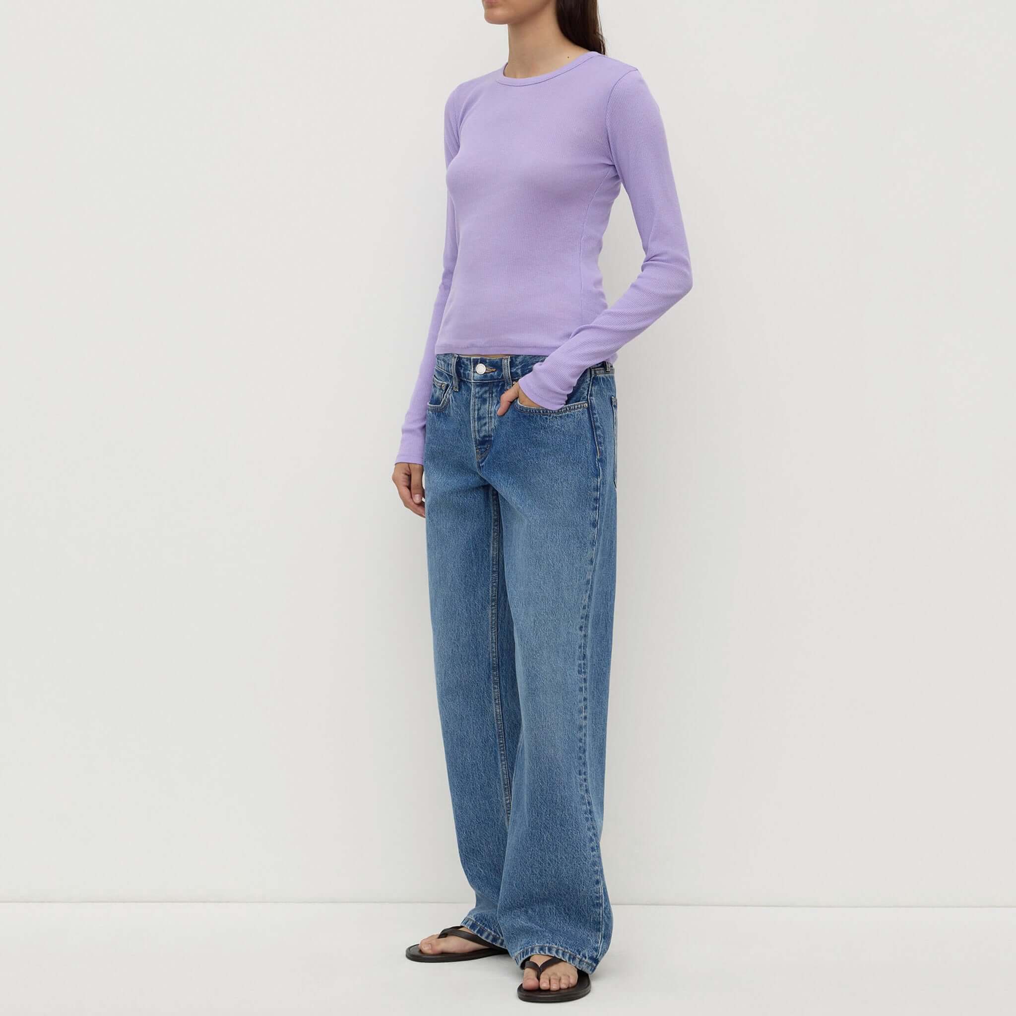 Assembly Label Zali Long Sleeve Tee - Mauve styled with wide-leg jeans, showcasing a casual yet chic outfit.