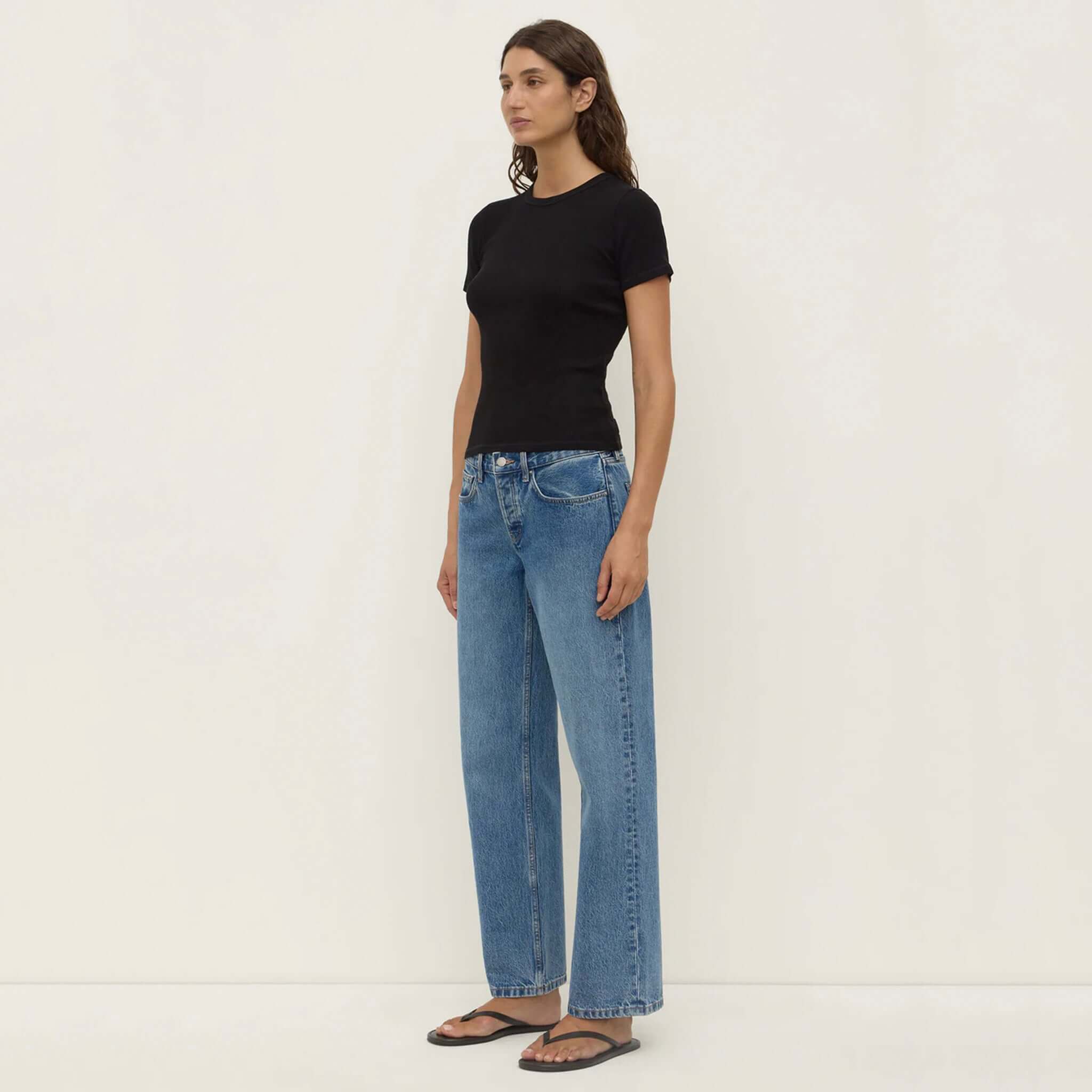 Alt Tag: Assembly Label Zali Short Sleeve Tee - Black ribbed fitted cotton crew neck tee styled with blue jeans