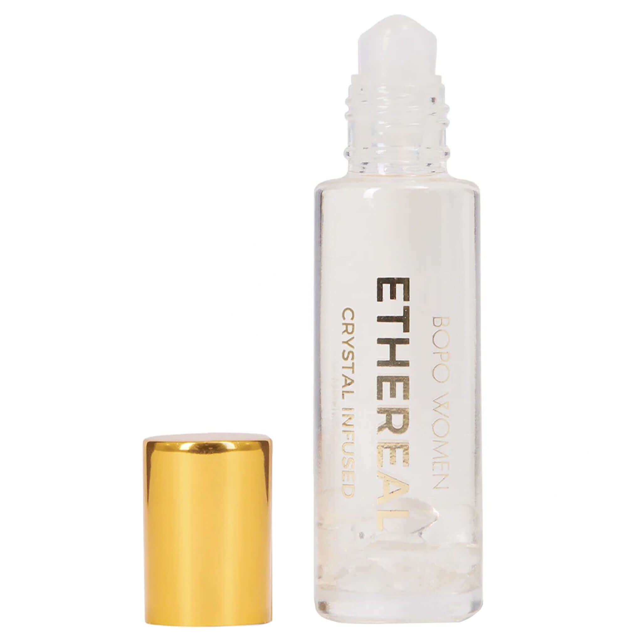 Ethereal rollerball bottle with gold cap on a white background