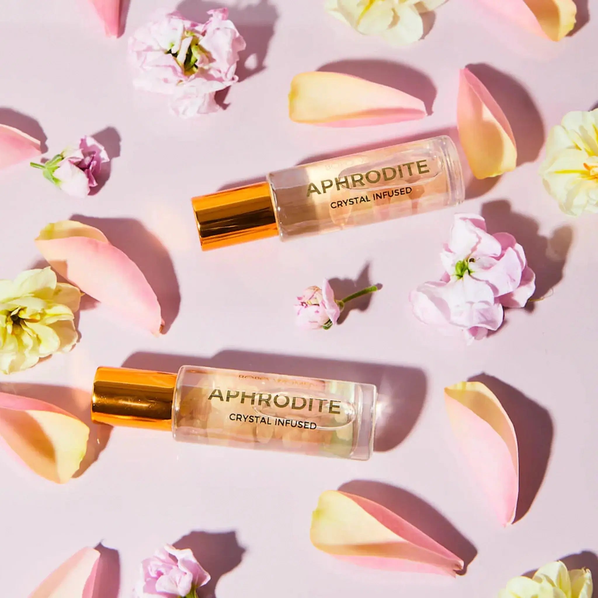 Perfume rollers with petals.