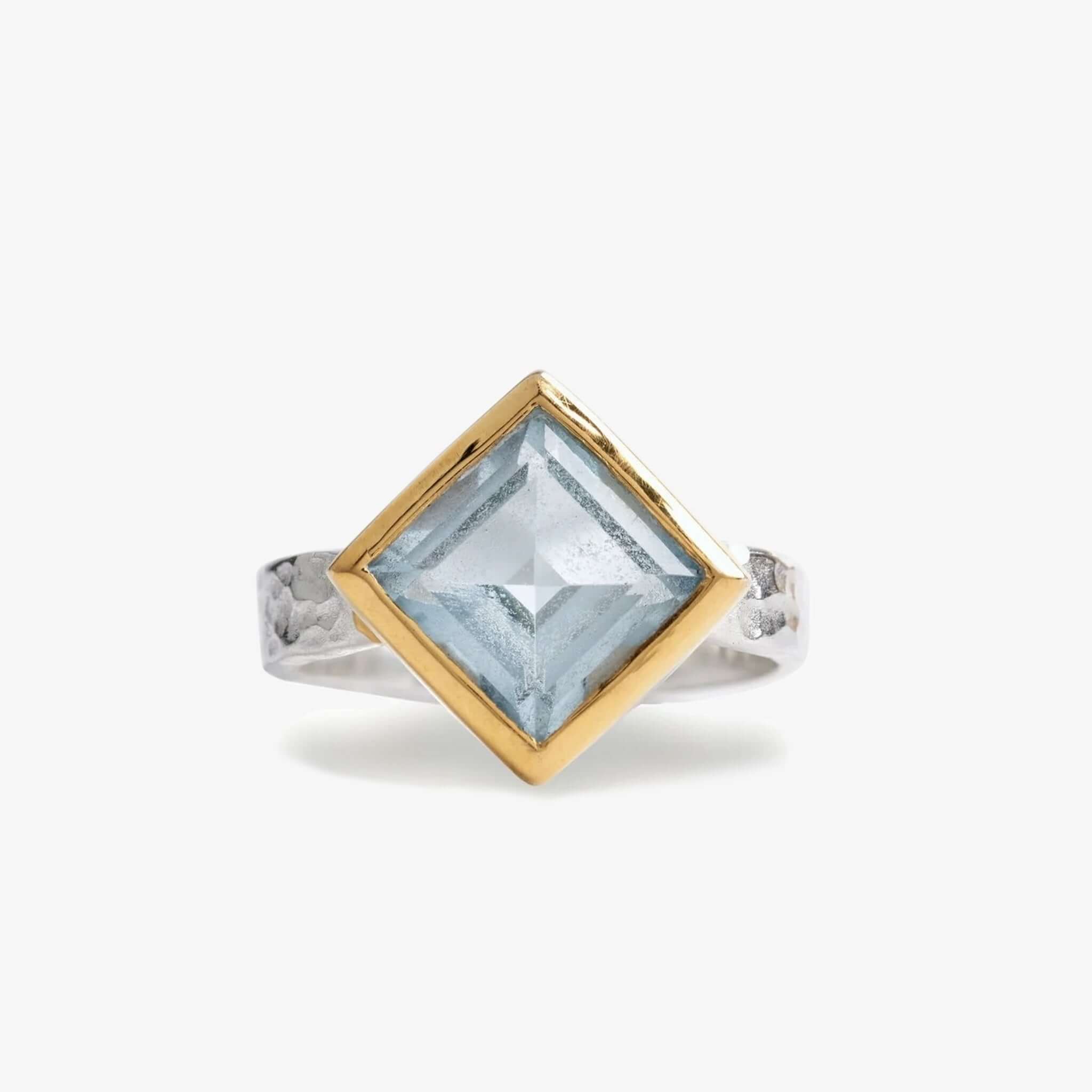 Cathy Pope Oracle Gold & Silver Ring - Blue Topaz set on a hammered sterling silver band with a diamond-shaped stone.