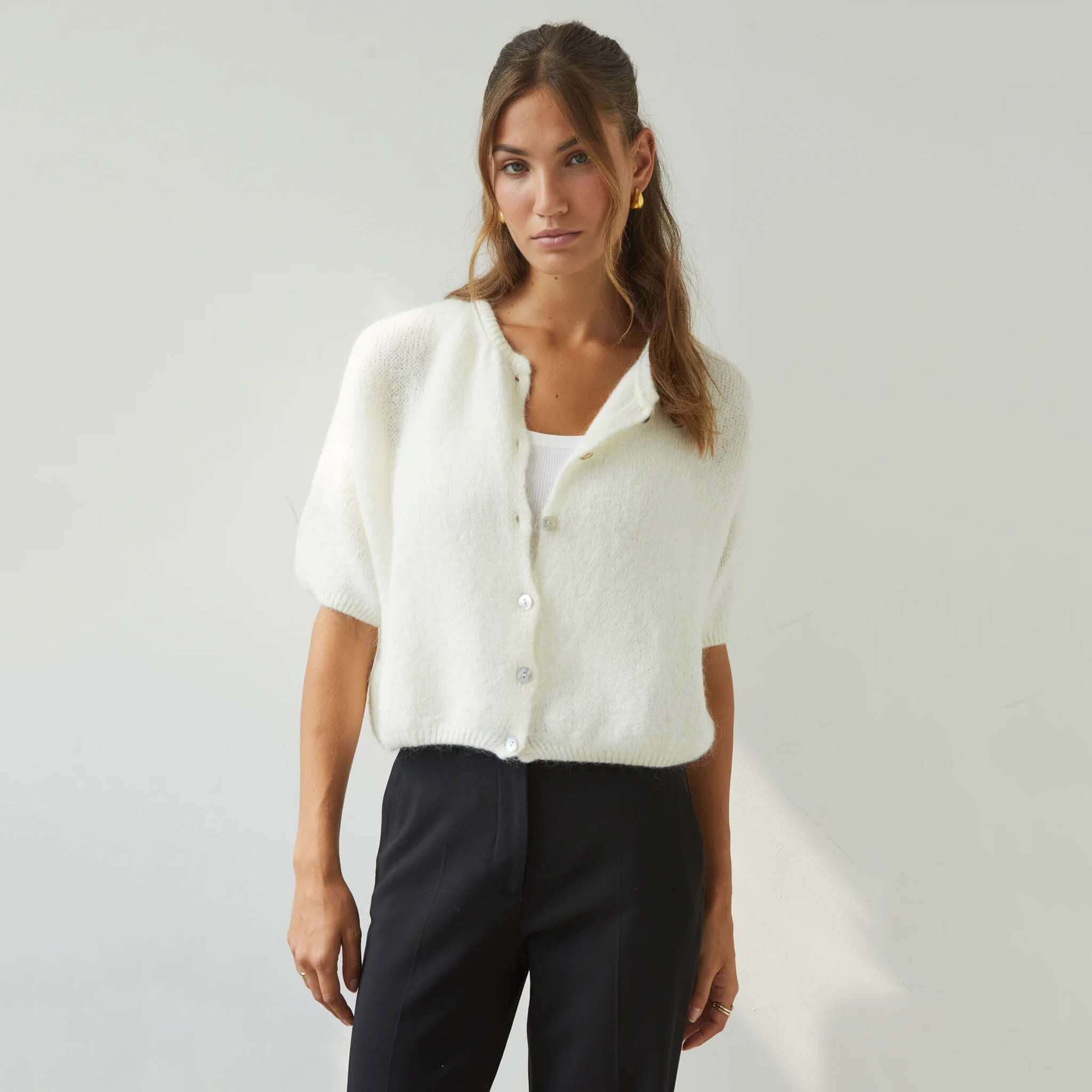 Charli Emme Mohair & Wool Blend Cardigan - Ivory featuring a cropped knit design with pearl buttons.