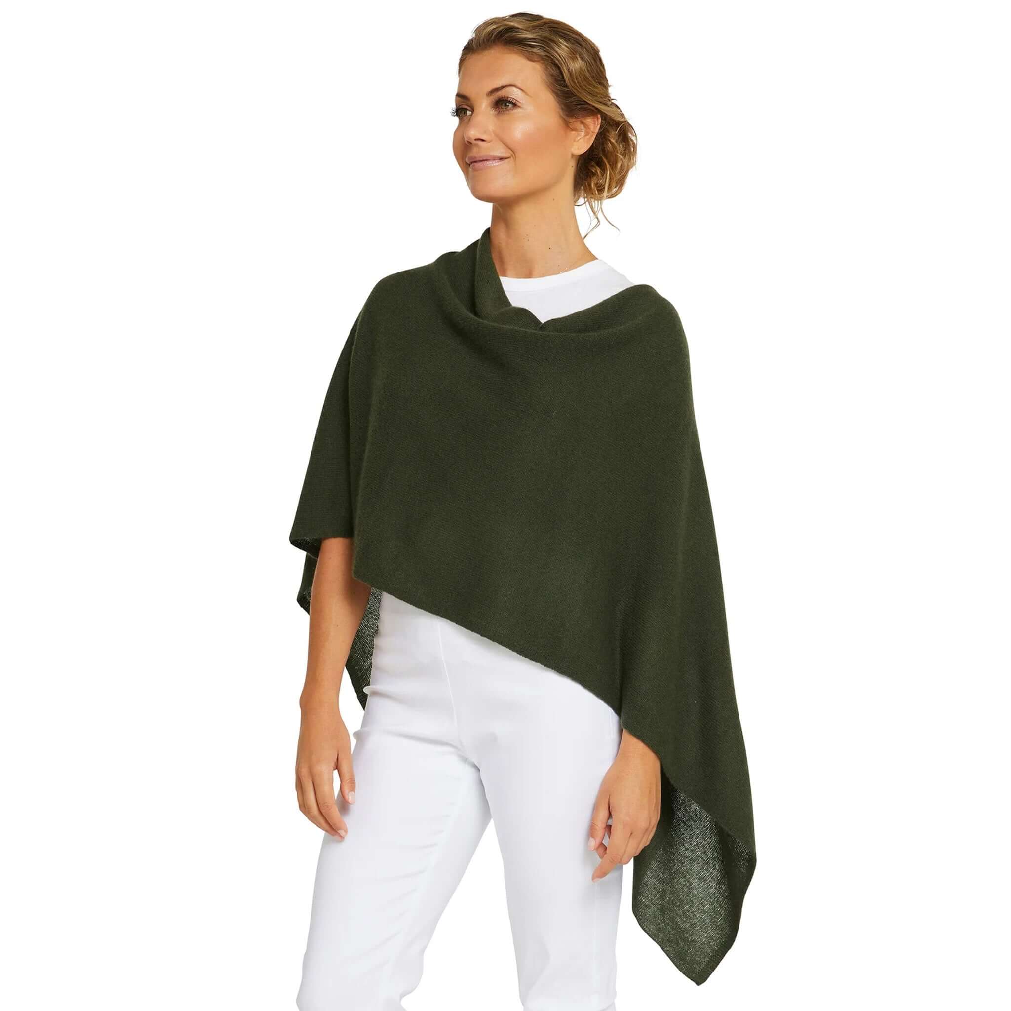 Alt Tag: Esperance & Co Classic Cashmere Topper - Olive worn as chic olive cashmere wrap poncho, lightweight travel and office layering piece