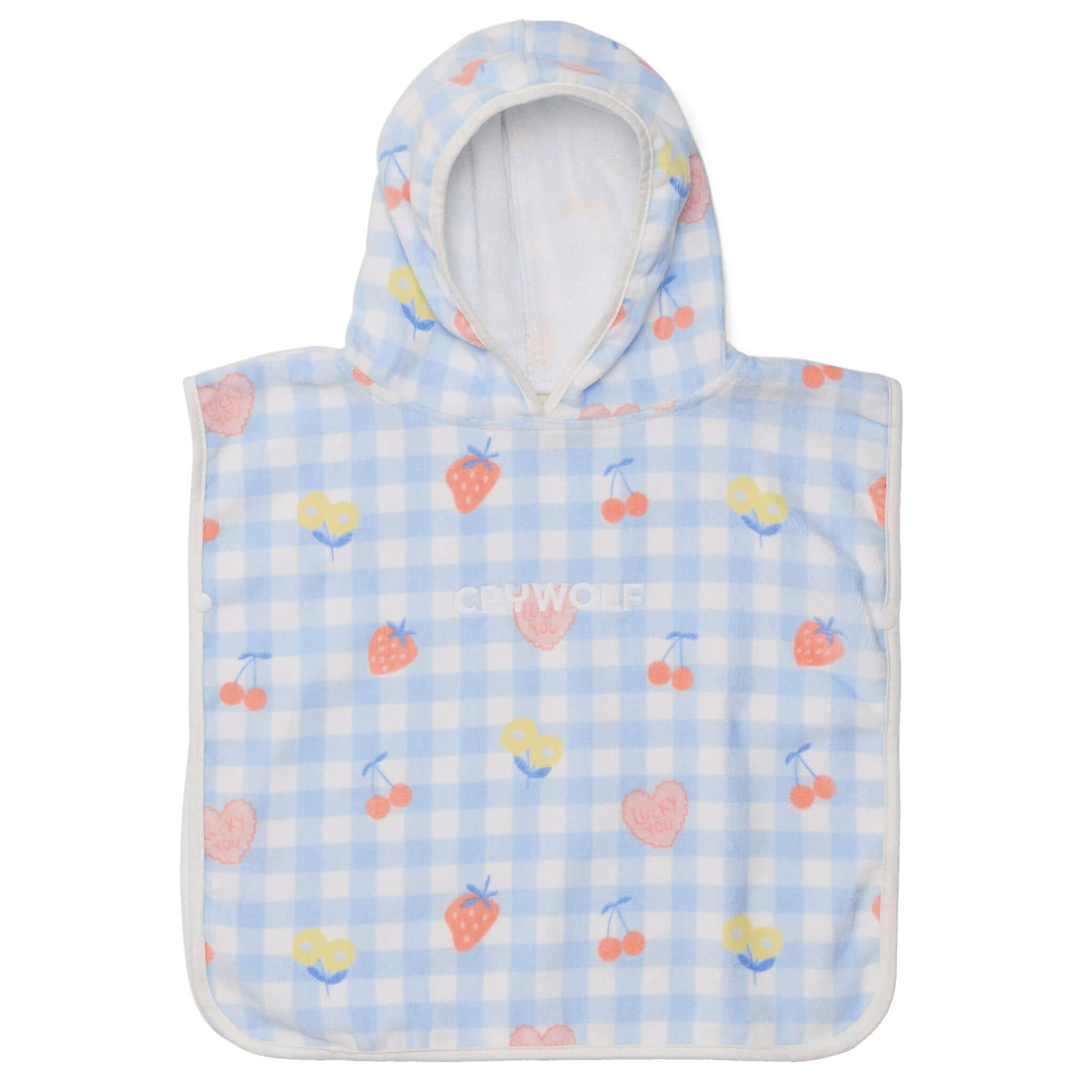 Hooded poncho with fruit pattern on a light blue background