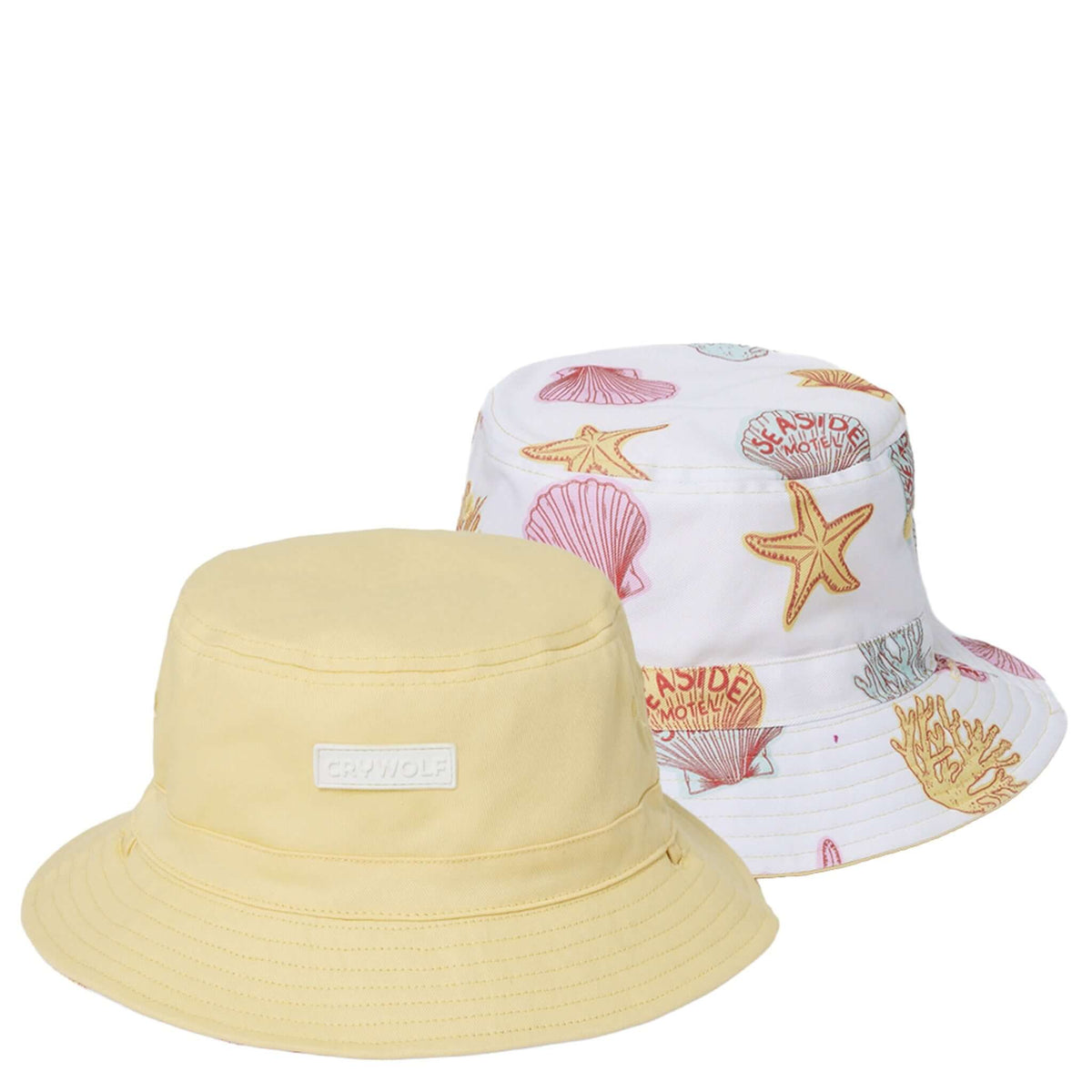Crywolf Reversible Bucket Hat - Shell, featuring yellow and shell-patterned sides, perfect for kids' summer adventures.