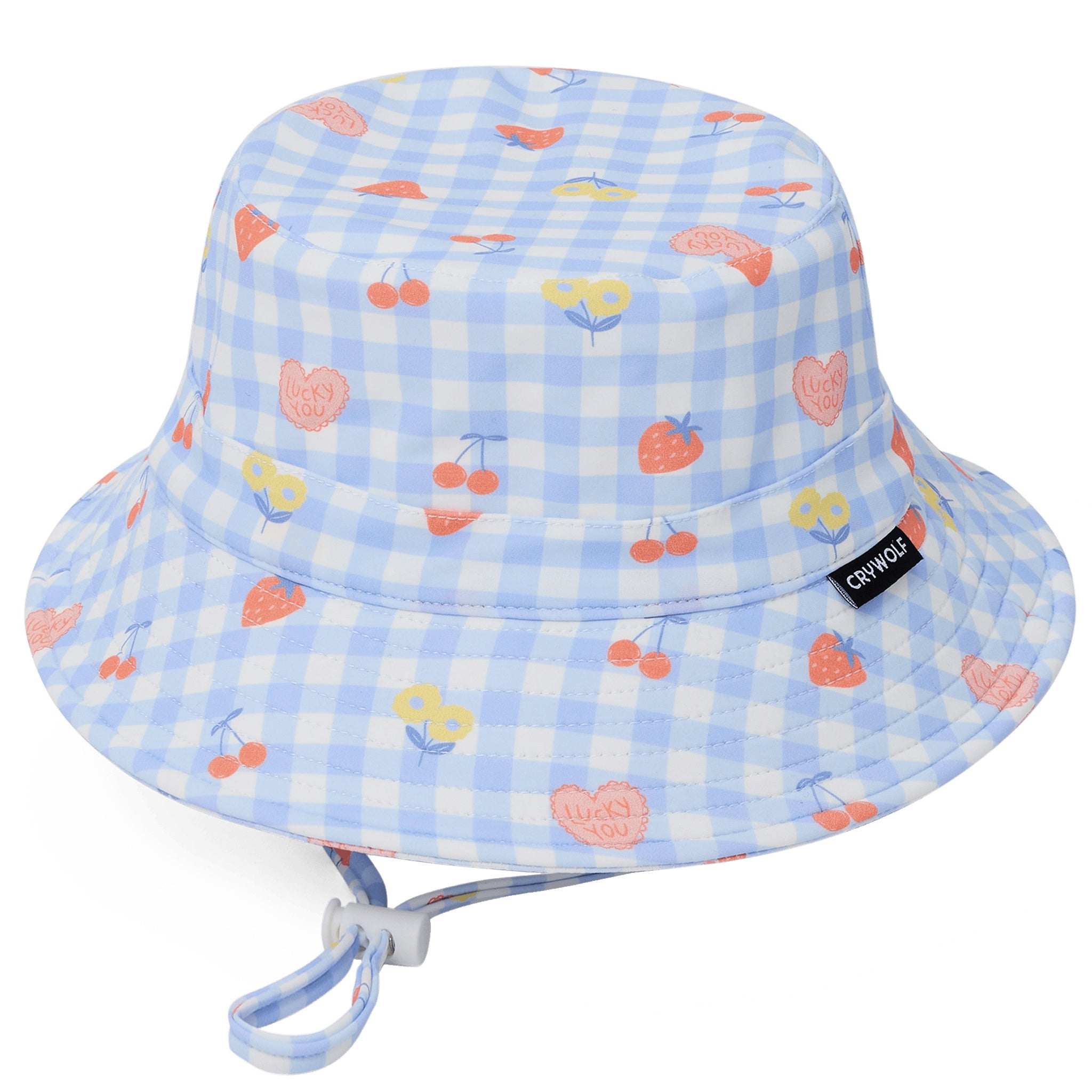 Bucket hat with a blue and white checkered pattern featuring fruits and flowers on a white background.