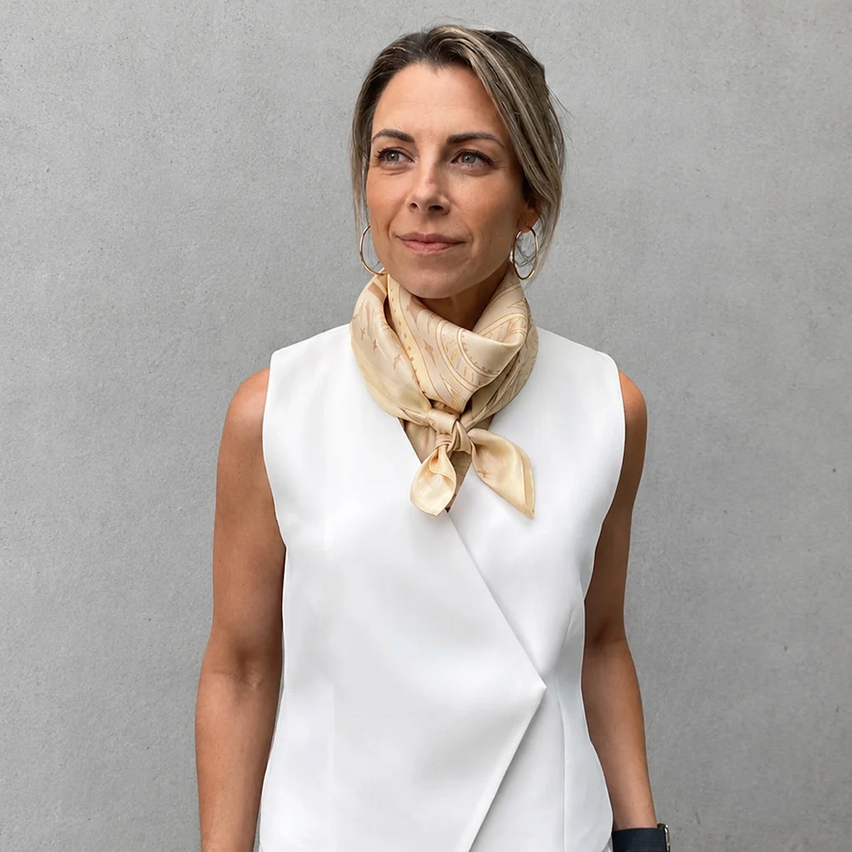Dark Hampton x Ellie Compton Silk Scarf - the Burnett knotted at the neck on model in a white vest