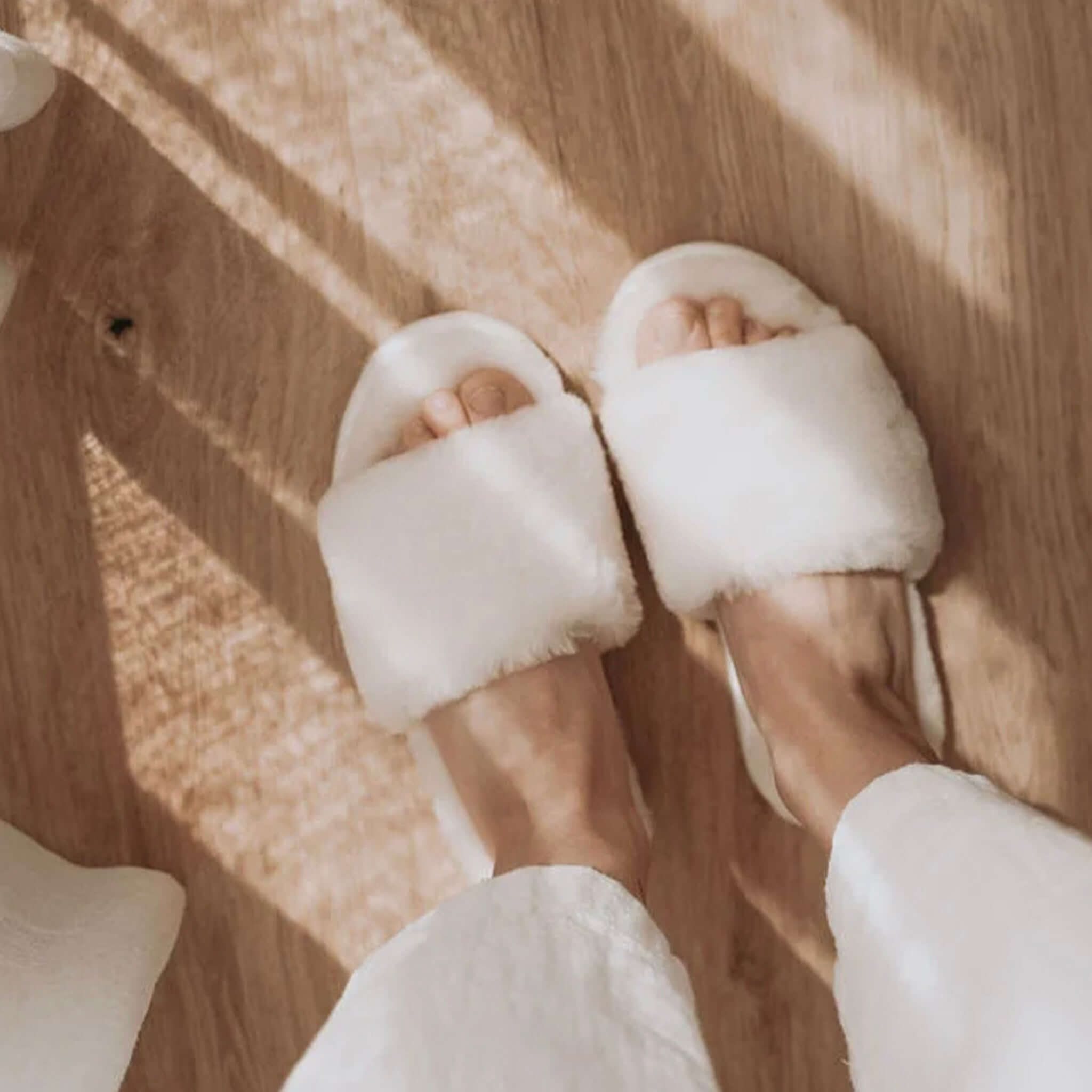 Alt Tag: EMU McKay Slippers - Natural women’s cosy slide slippers with plush natural sheepskin lining, extra soft warm comfort