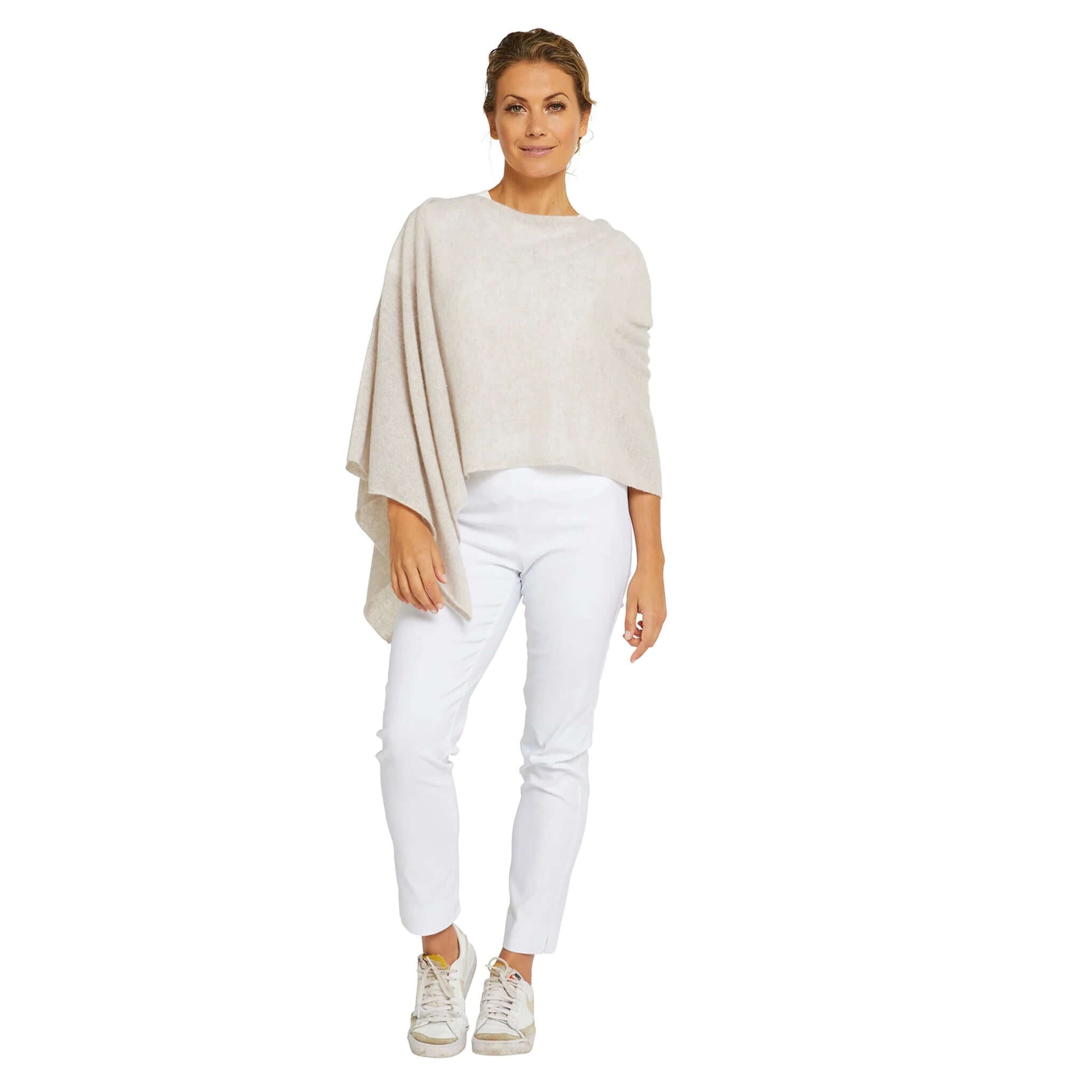 Alt Tag: Esperance & Co Classic Cashmere Topper - Latte worn as a chic poncho wrap on model, soft cashmere layering piece for travel & office