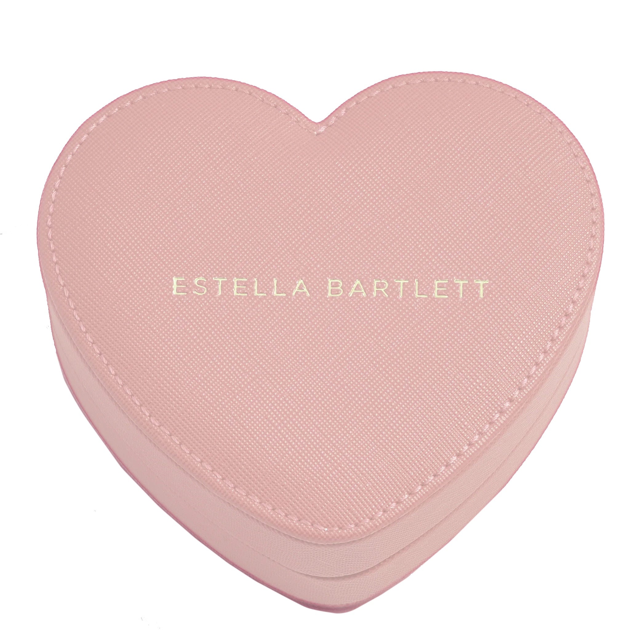 Pink heart-shaped jewelry box with 'Estella Bartlett' branding on a white background