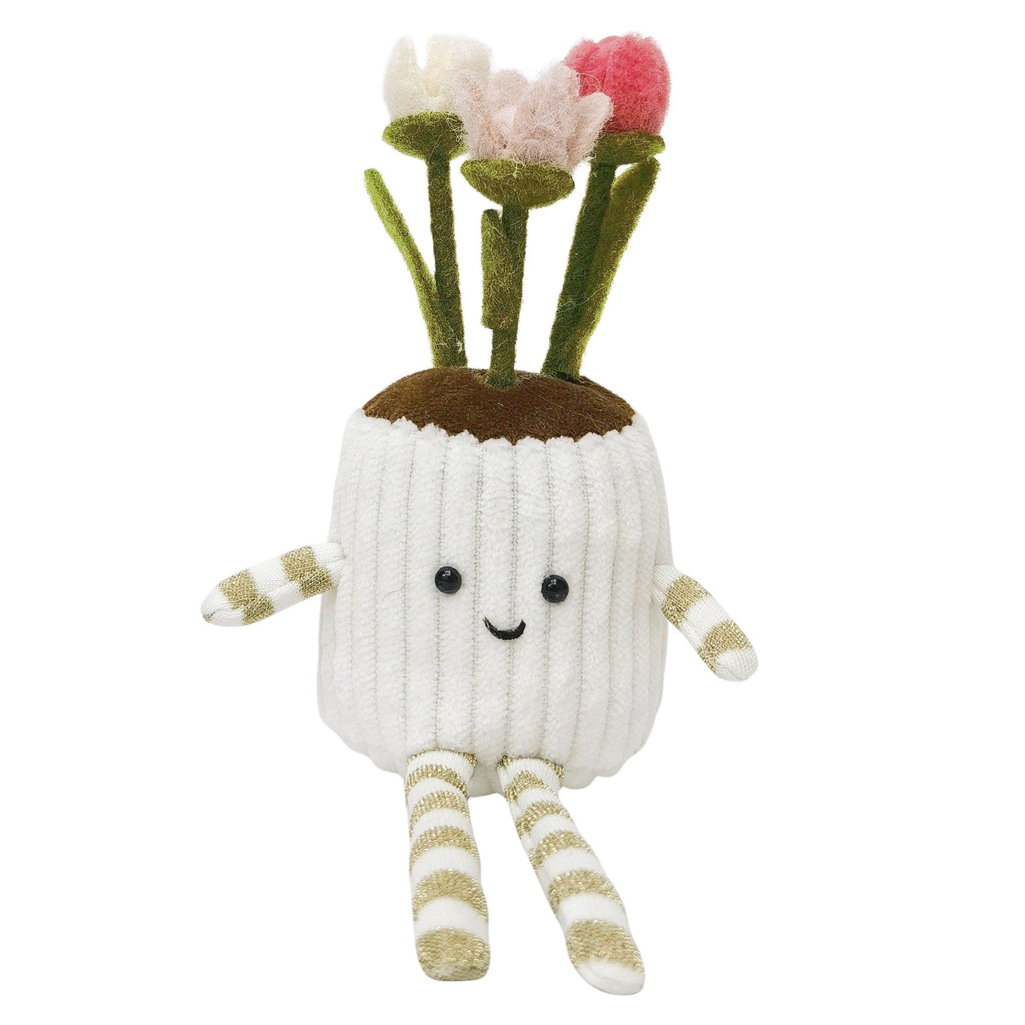 Toy figure of a plant with flowers on a white background