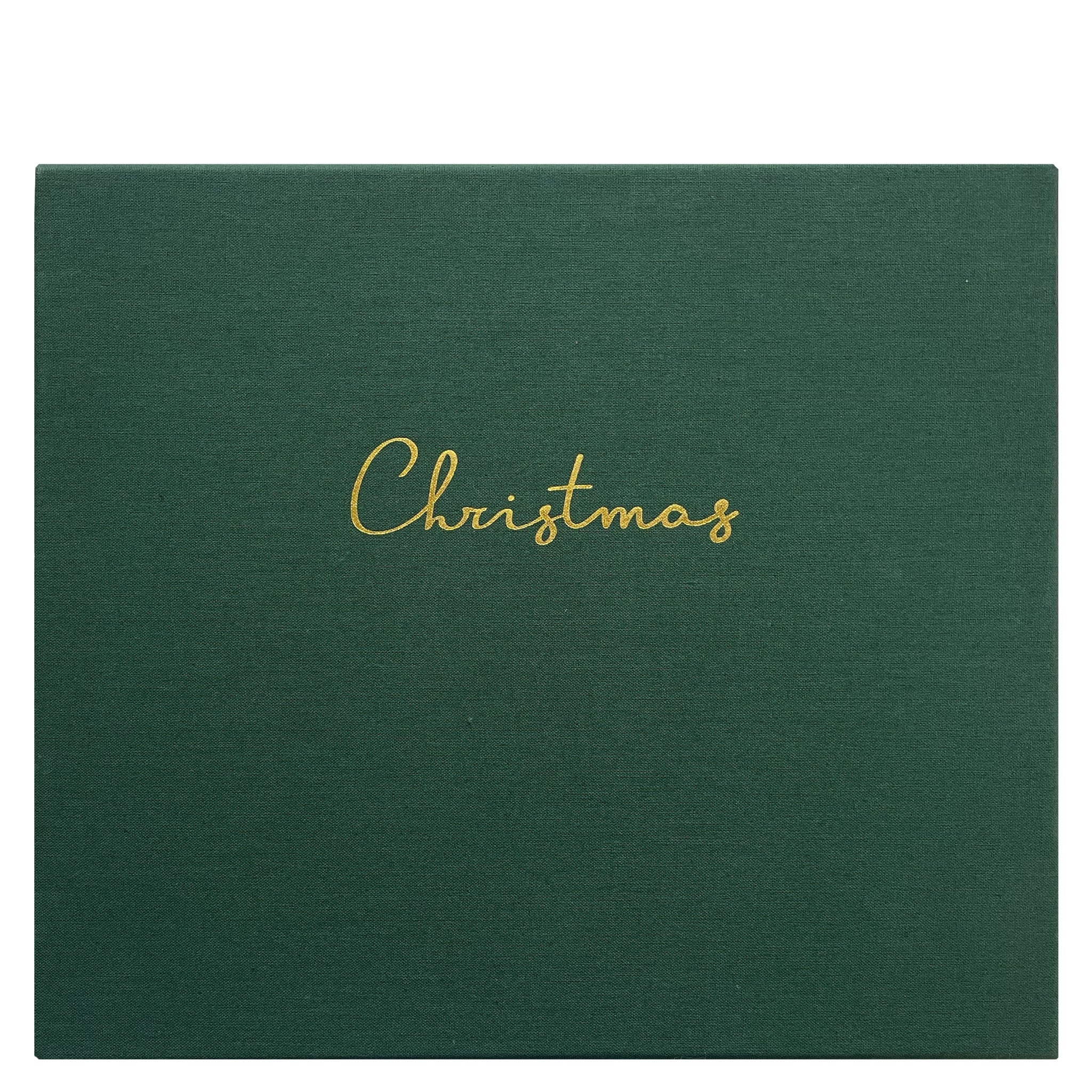 Green textured paper with 'Christmas' written in gold on a white background