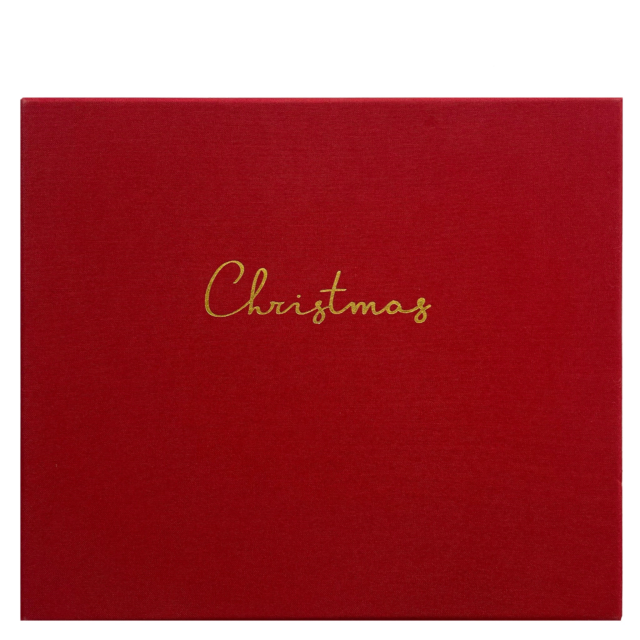 Red textured paper with 'Christmas' written in gold on a white background