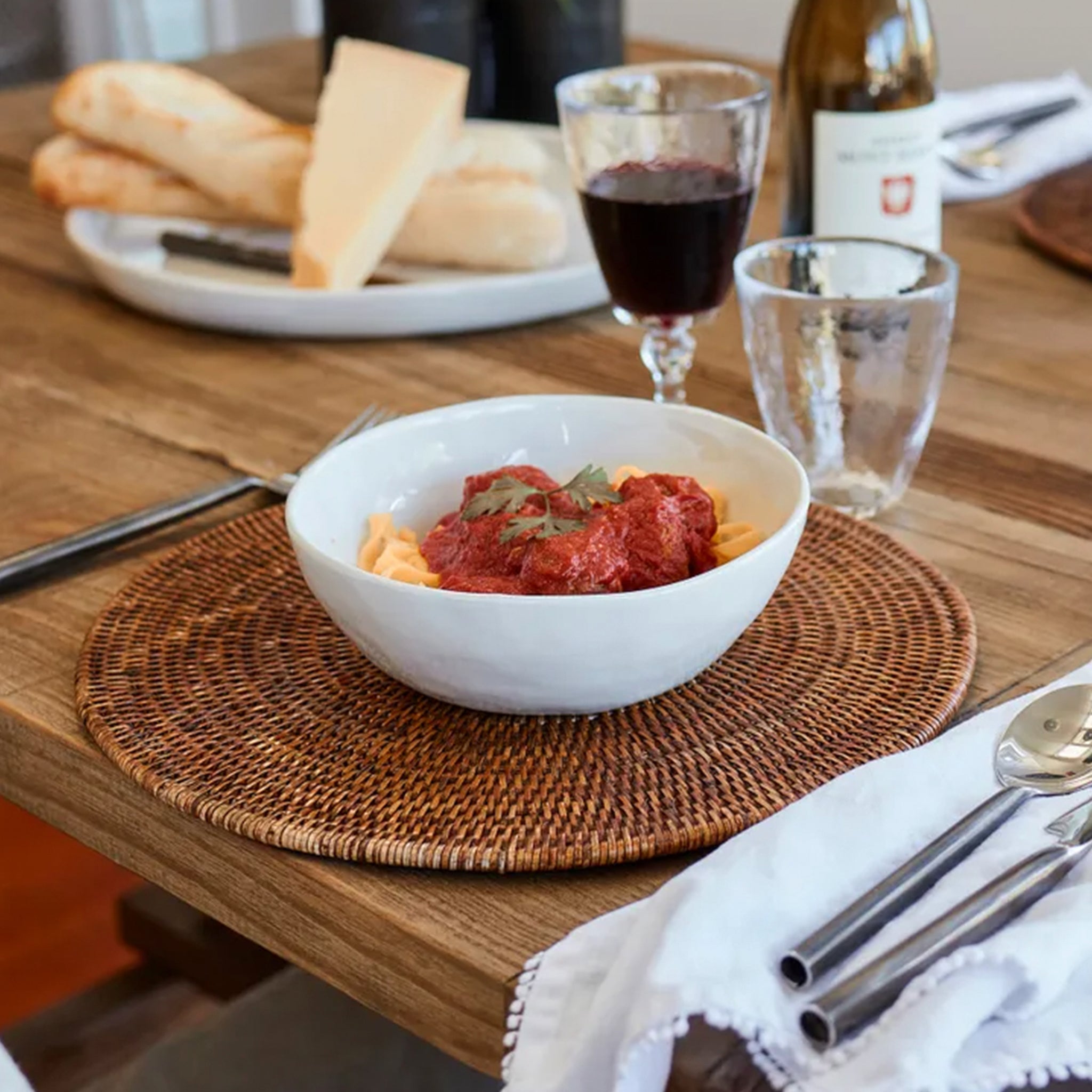 White stoneware bowl on a table.