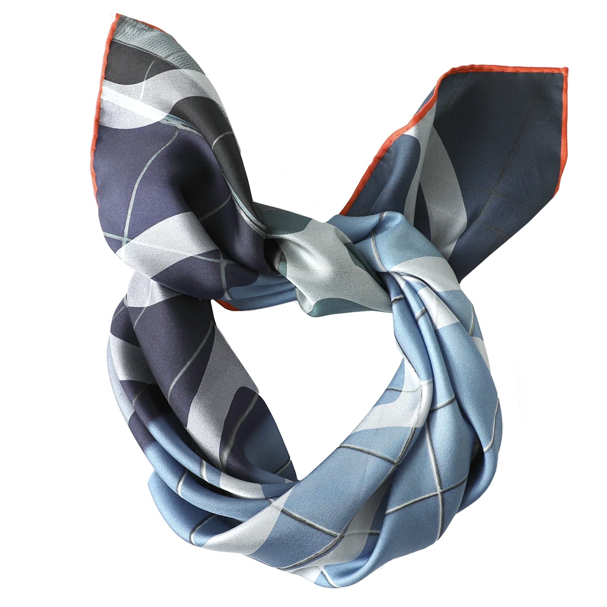 Colorful patterned scarf tied in a knot on a white background