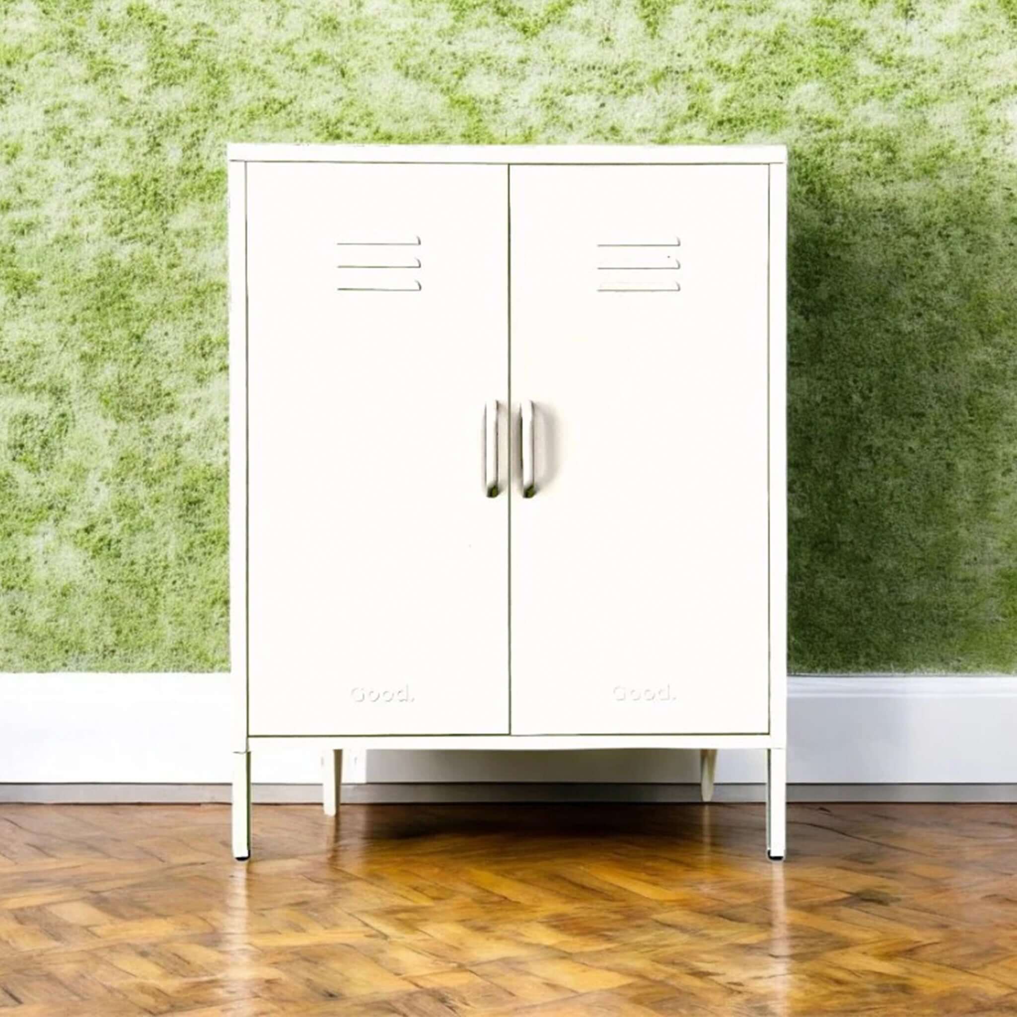 Alt Tag: Good. Edna Contemporary Metal Locker white steel double-door storage cabinet on legs in hallway with green wall