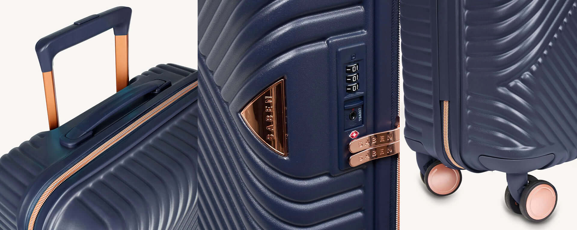 Navy blue suitcase with rose gold accents on a white background