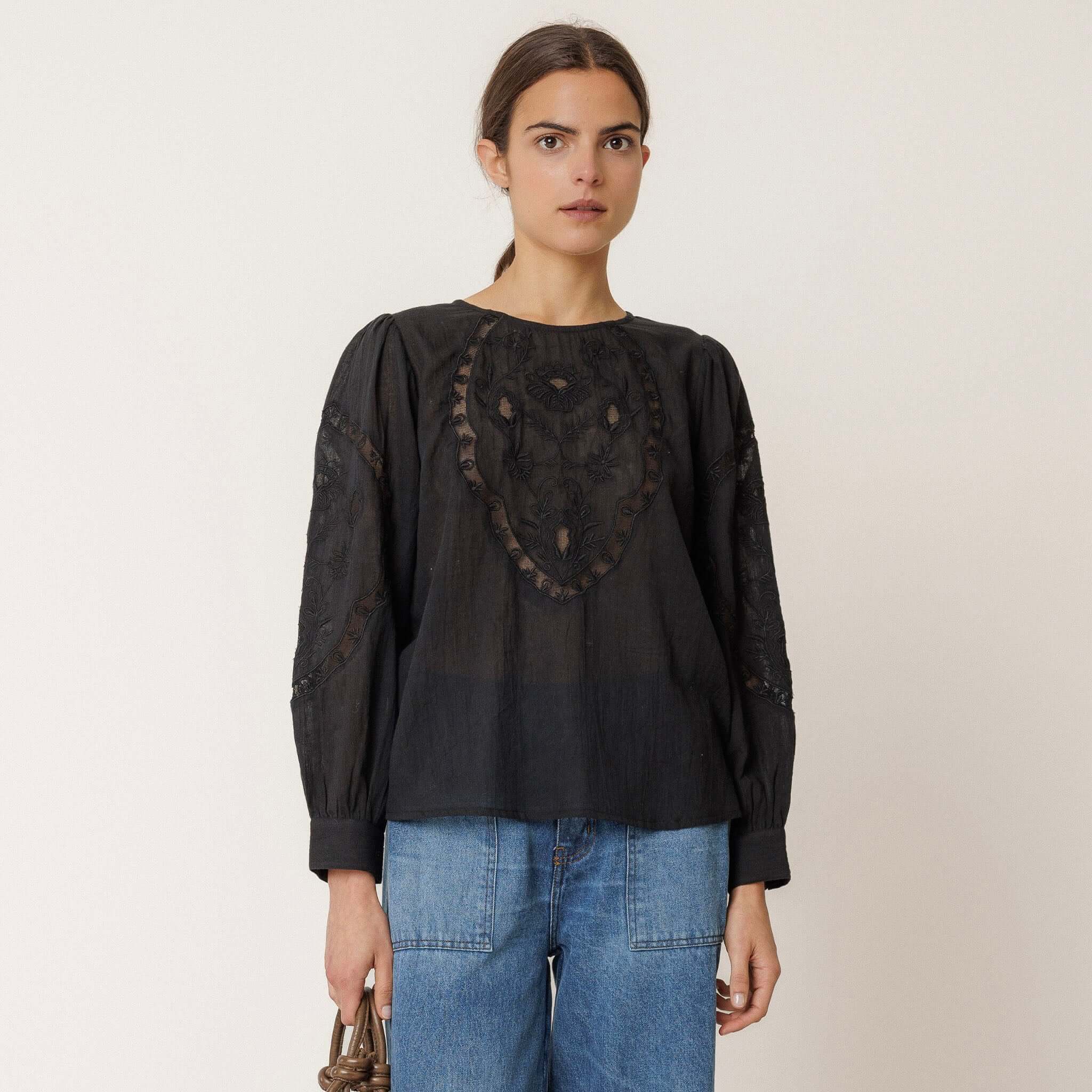 Alt Tag: Indi & Cold Organic Cotton Romantic Embroidered Blouse - Black on model, floral embroidery organic cotton gauze A-line silhouette