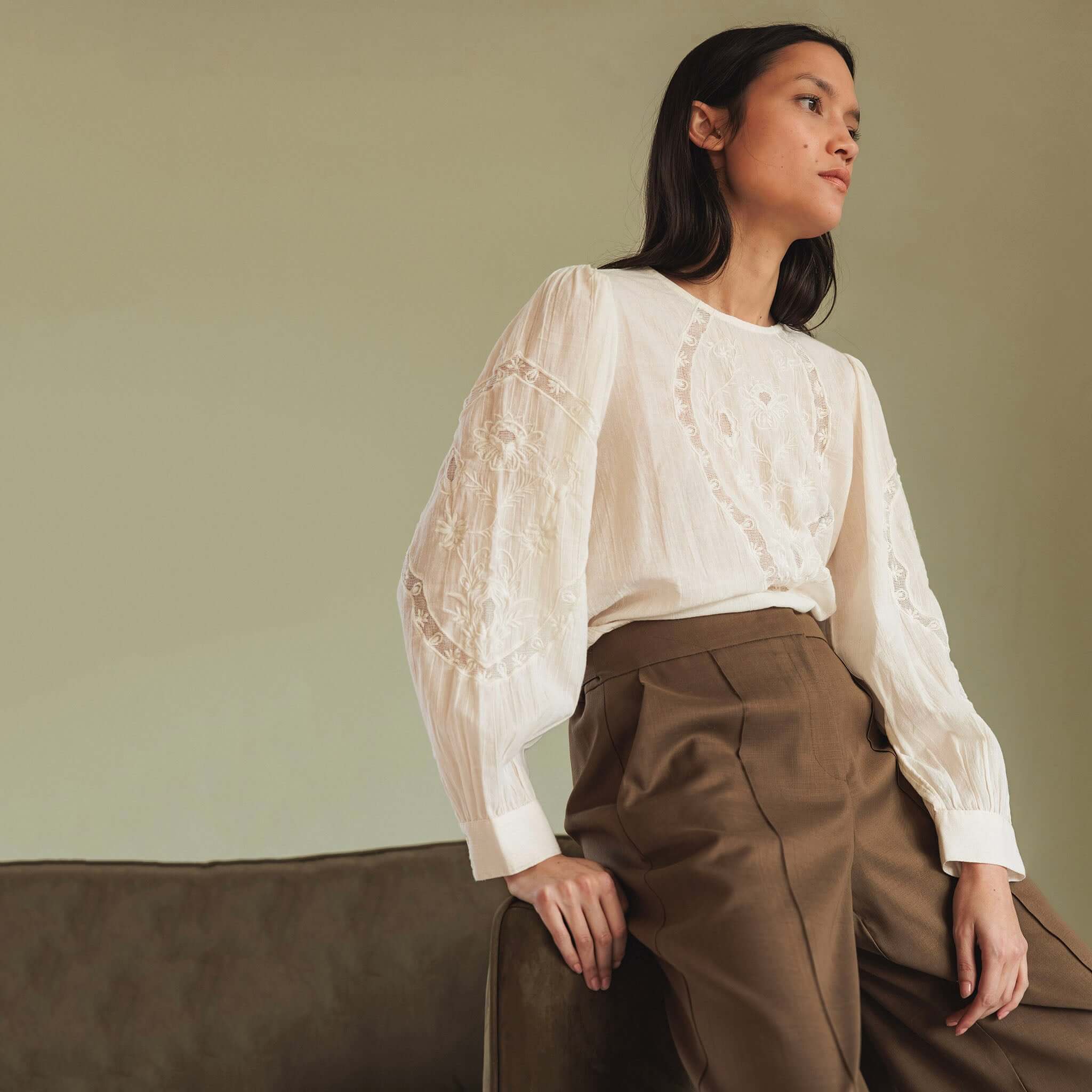 Alt Tag: Indi & Cold Organic Cotton Romantic Embroidered Blouse - White on model, floral embroidered organic cotton gauze blouse with puff sleeves