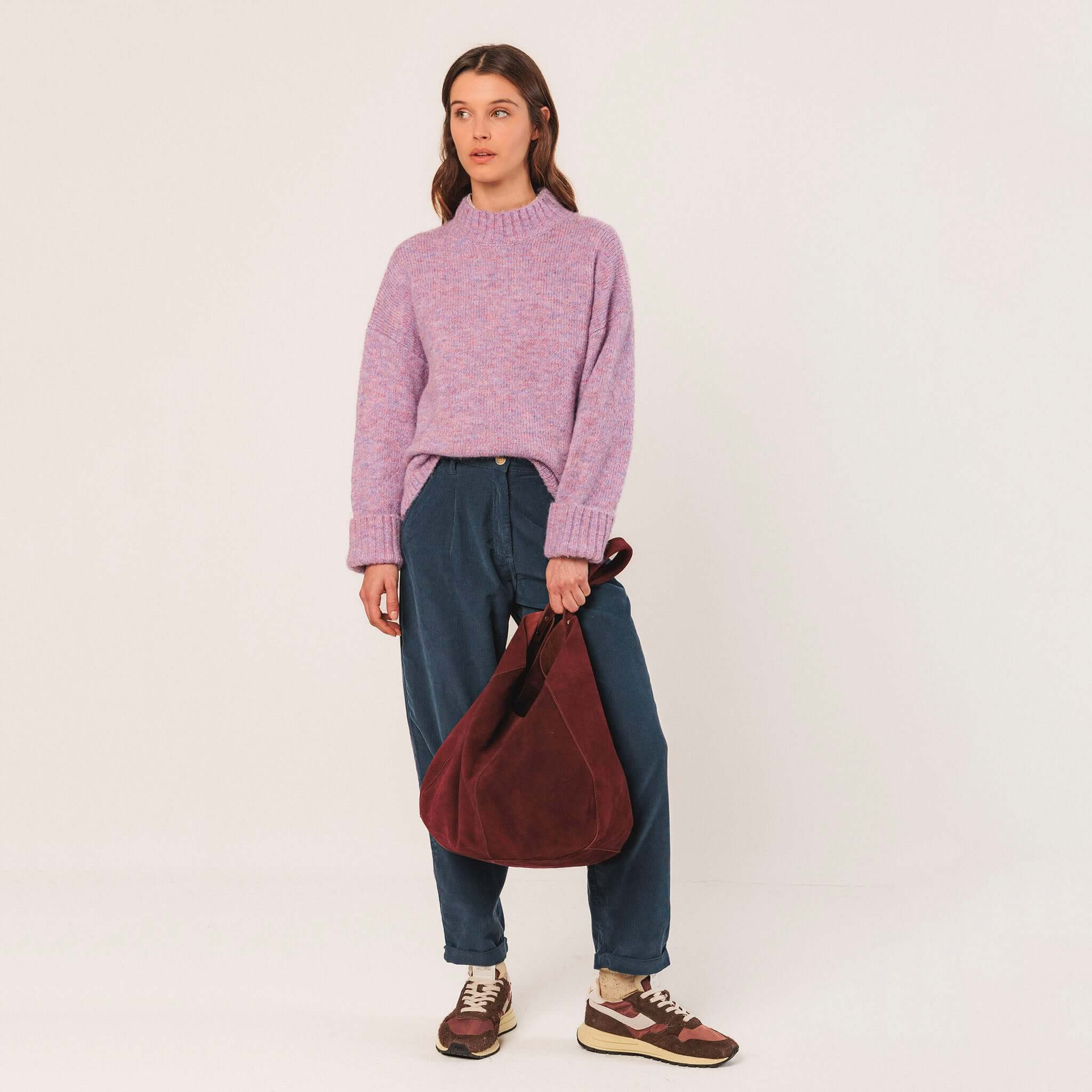 Indi & Cold Perkins Collar Jersey - Mauve worn by model, relaxed dropped-shoulder knit styled with denim trousers