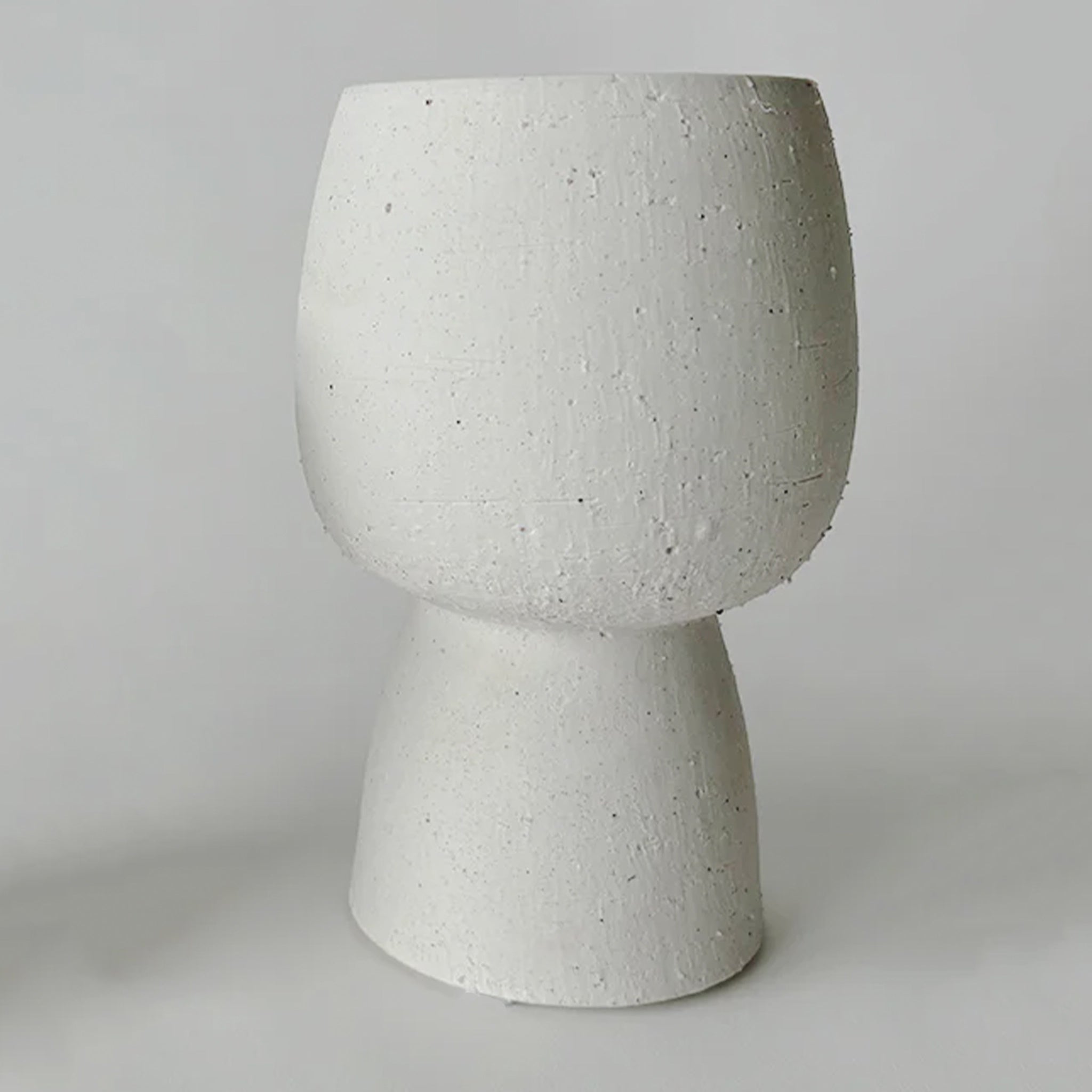 Ceramic vase on a gray background