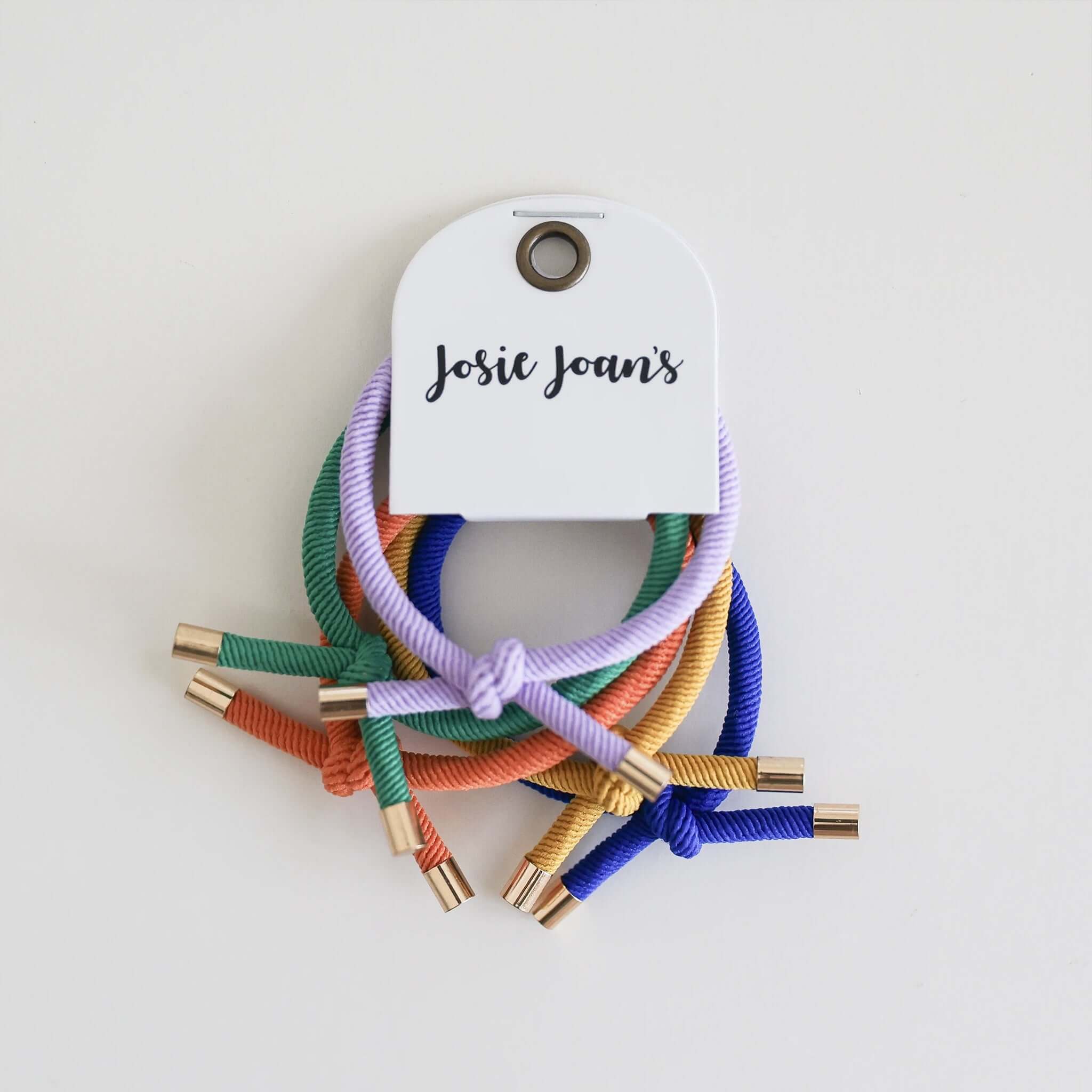 Alt Tag: Josie Joan's Hair Tie Set - Blake five knotted kids hair ties in vibrant colours with gold tips for ponytails & pigtails