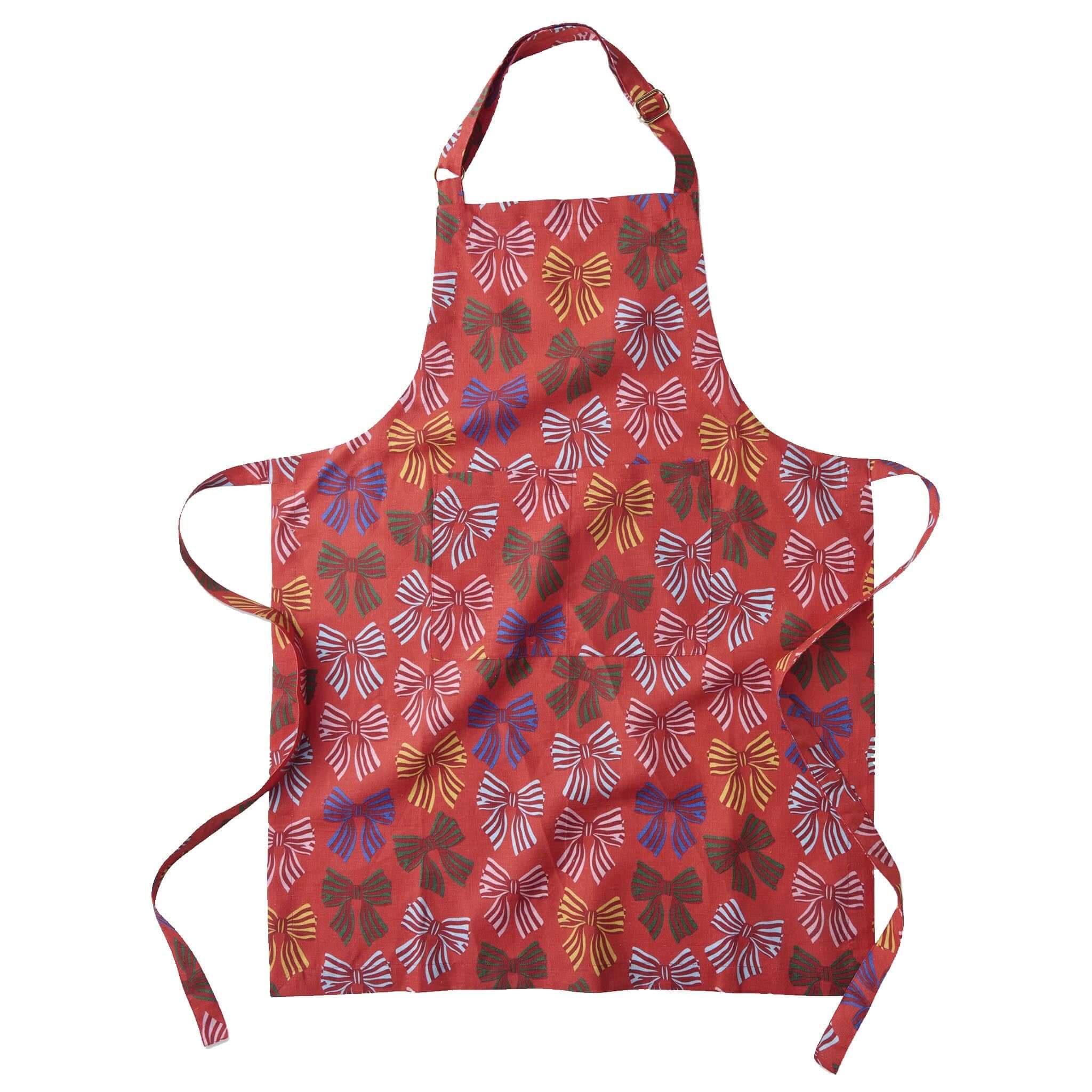 Red apron with colorful bow pattern on a white background