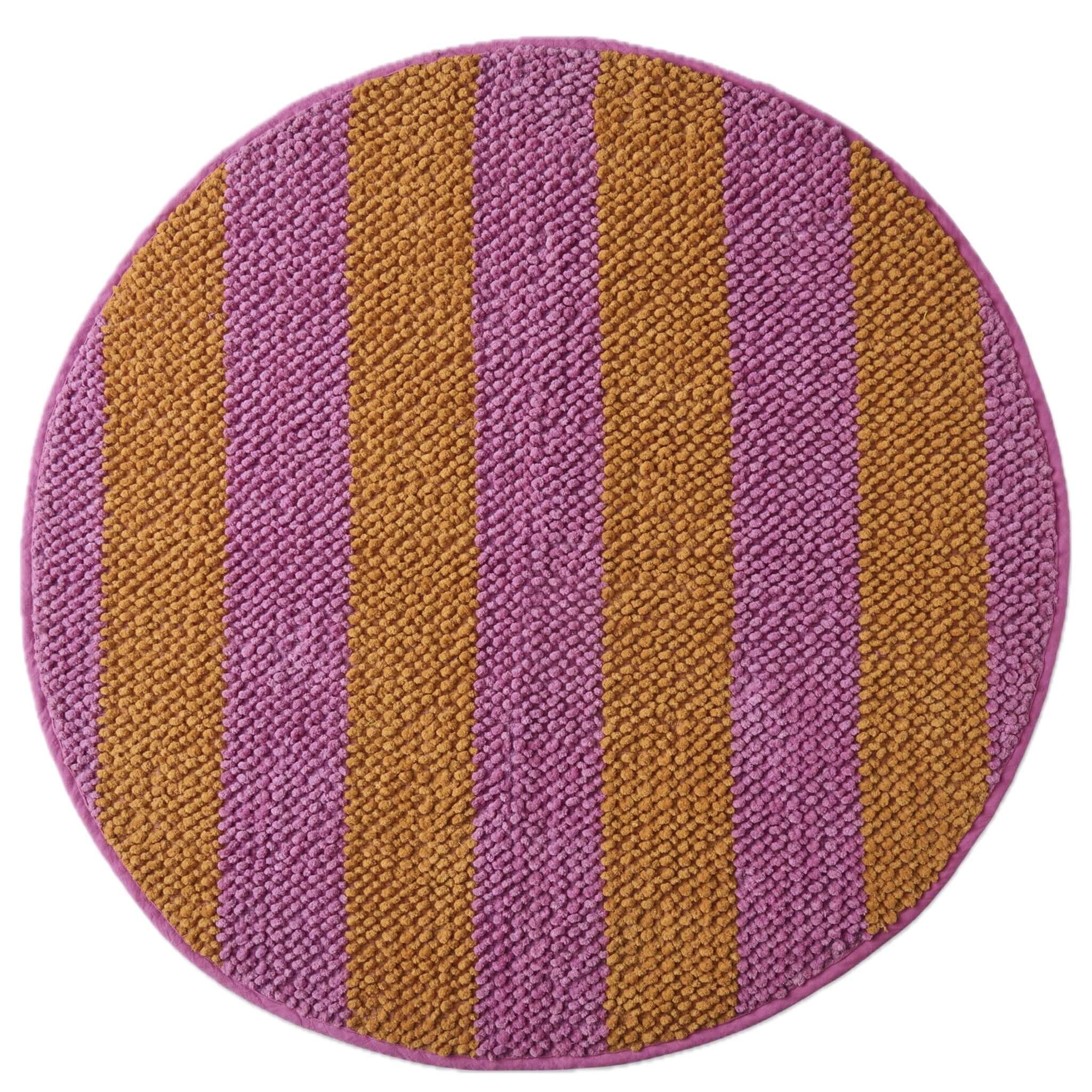 Round bath mat with purple and brown striped pattern on a white background