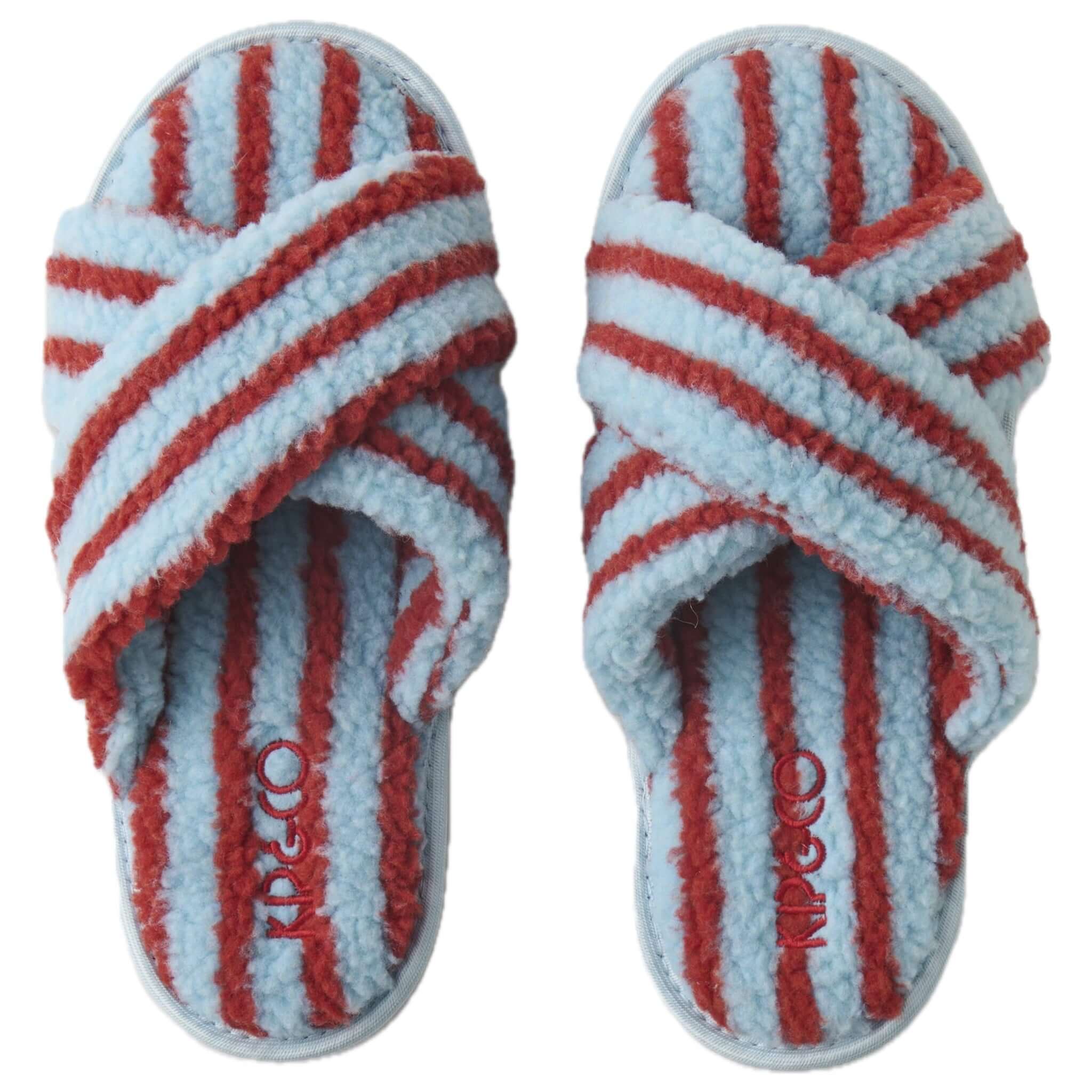 Pair of striped slippers with red and blue pattern on a white background