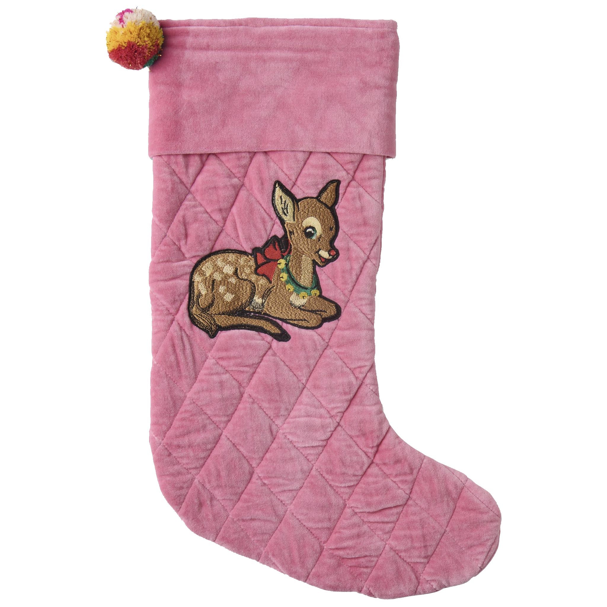 Pink Christmas stocking with a deer patch on a white background